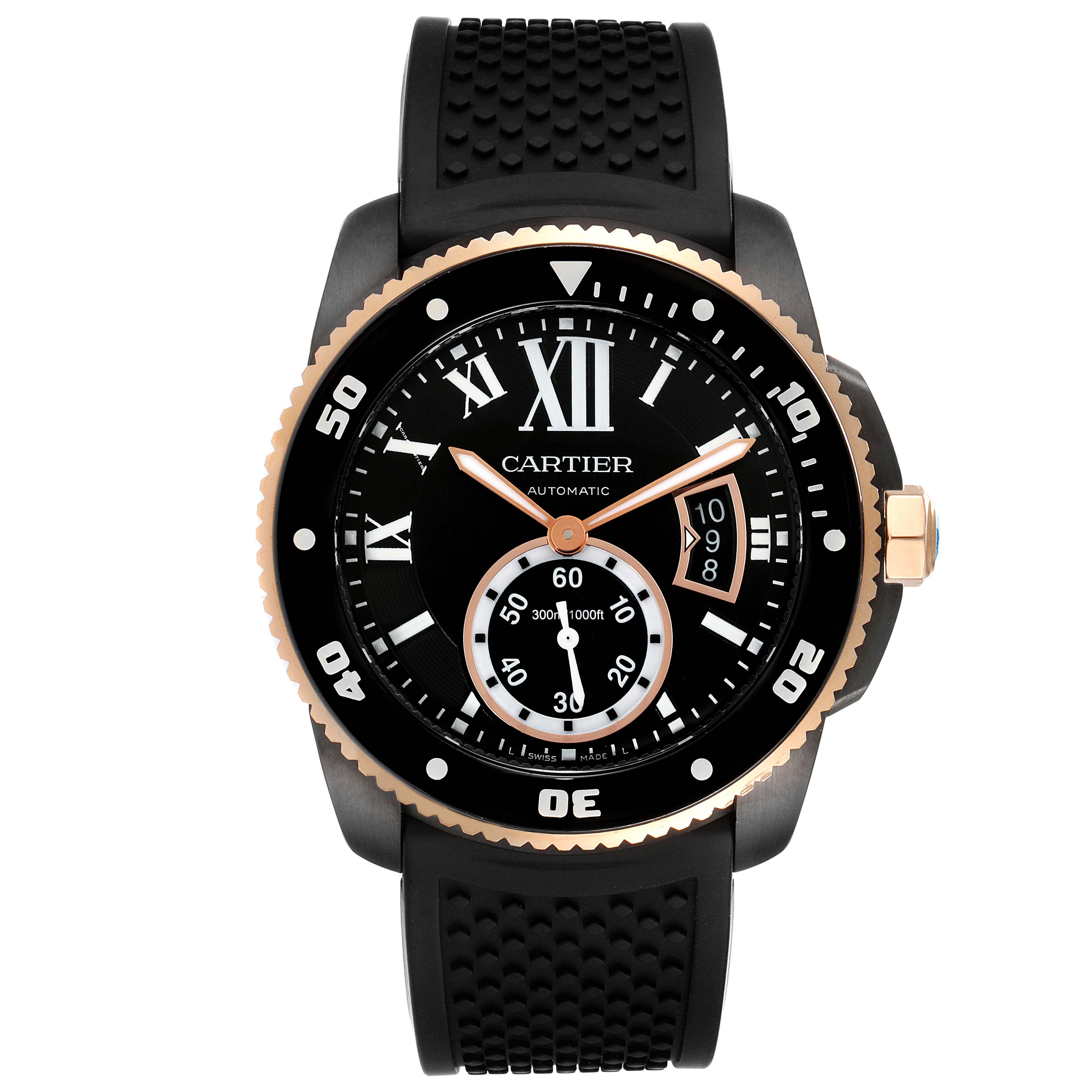 The image shows a frontal view of the Calibre de Cartier automatic watch by Cartier, featuring its dial, bezel, and rubber strap.