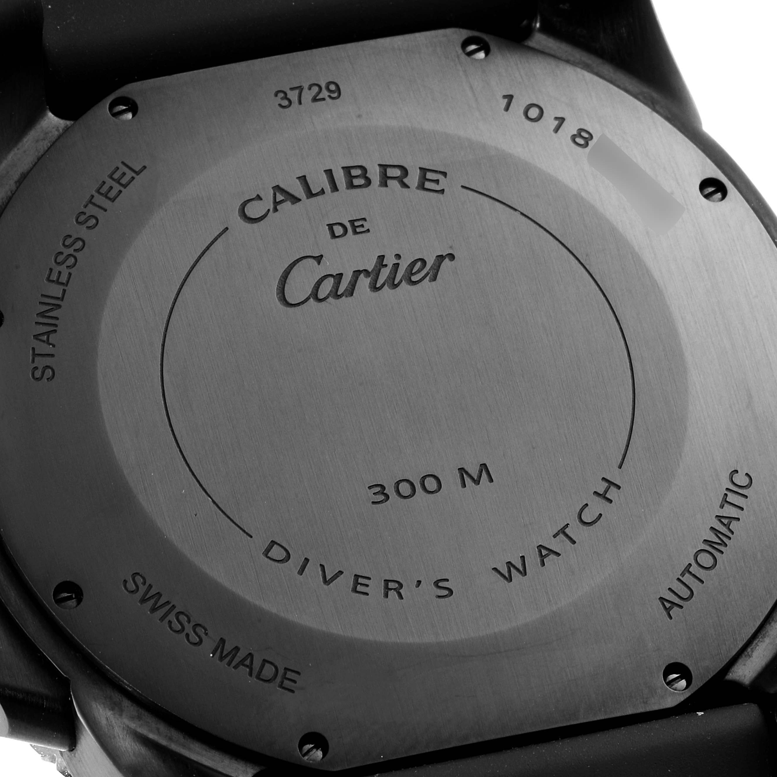 The image shows the back case of a Calibre de Cartier watch by Cartier, highlighting details such as water resistance, material, and movement type.