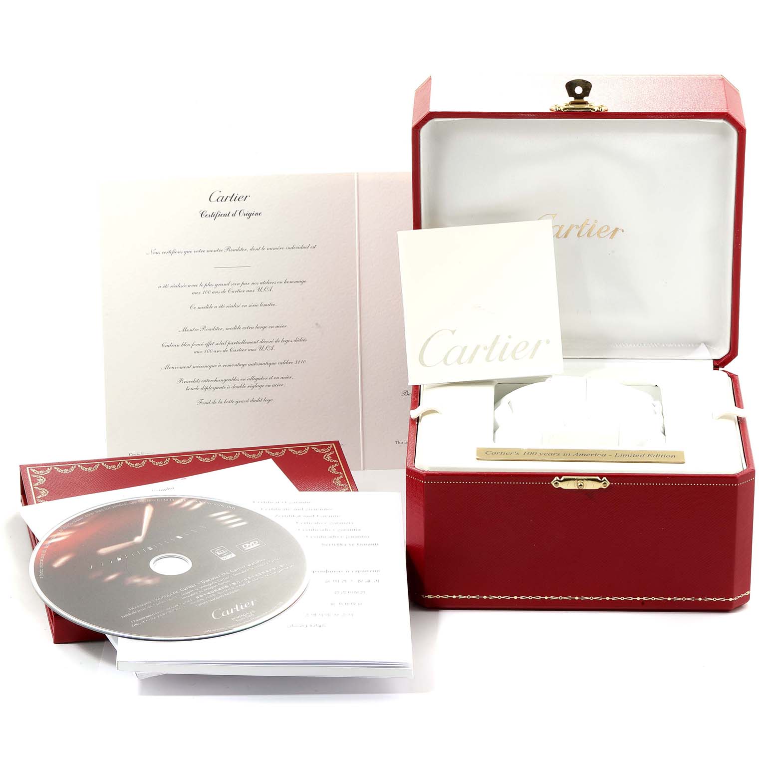 The image shows the packaging of the Cartier Roadster W6206012 Men
s Stainless Steel Blue Dial W6206012 Men
s Stainless Steel Blue Dial, including a red box, documents, and a CD.