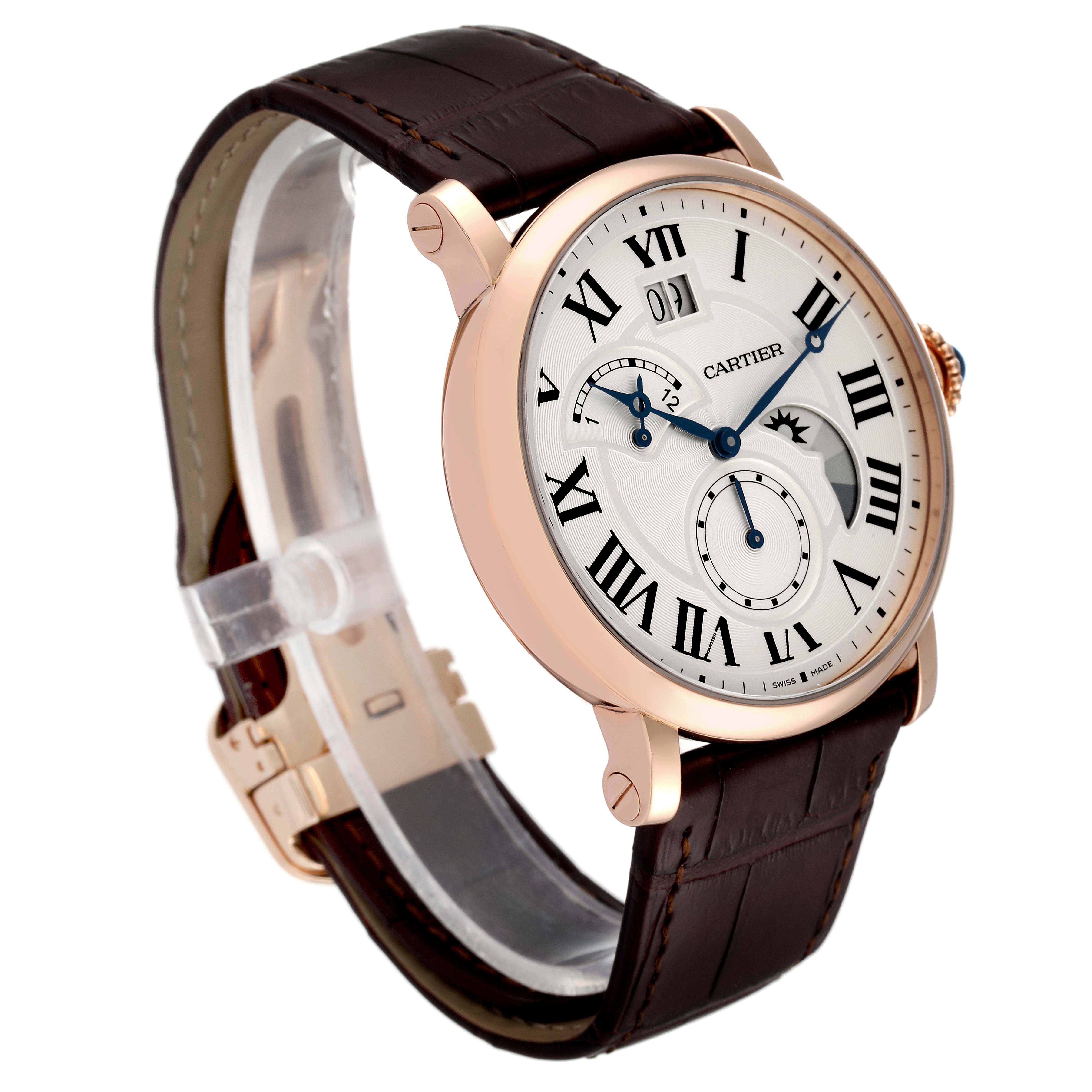 The Cartier Rotonde W1556240 Men's Rose Gold Silver Dial W1556240 Men's Rose Gold Silver Dial watch is shown at an angle highlighting its face, bezel, crown, and leather strap.