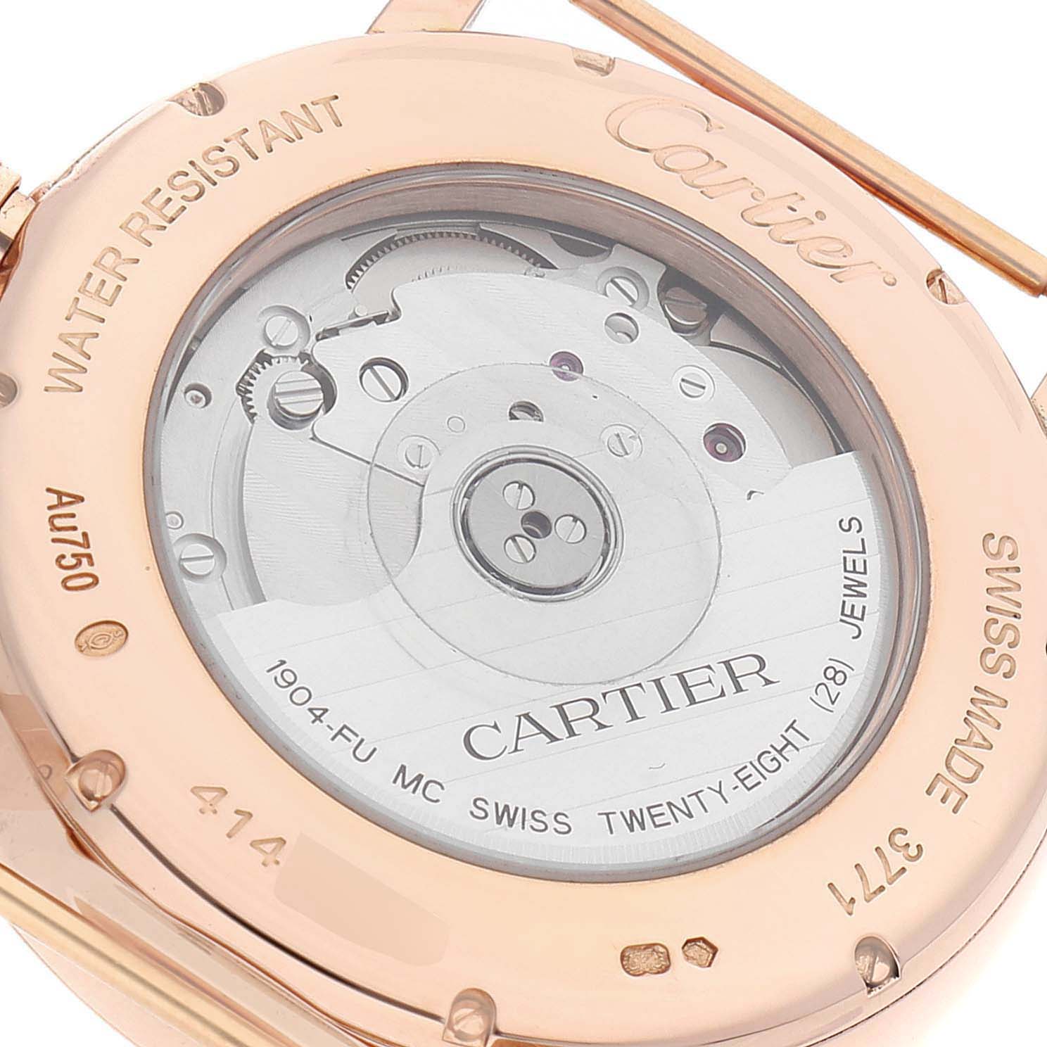 The image shows the back view of a Cartier Rotonde W1556240 Men's Rose Gold Silver Dial W1556240 Men's Rose Gold Silver Dial watch, highlighting its movement and inscriptions.
