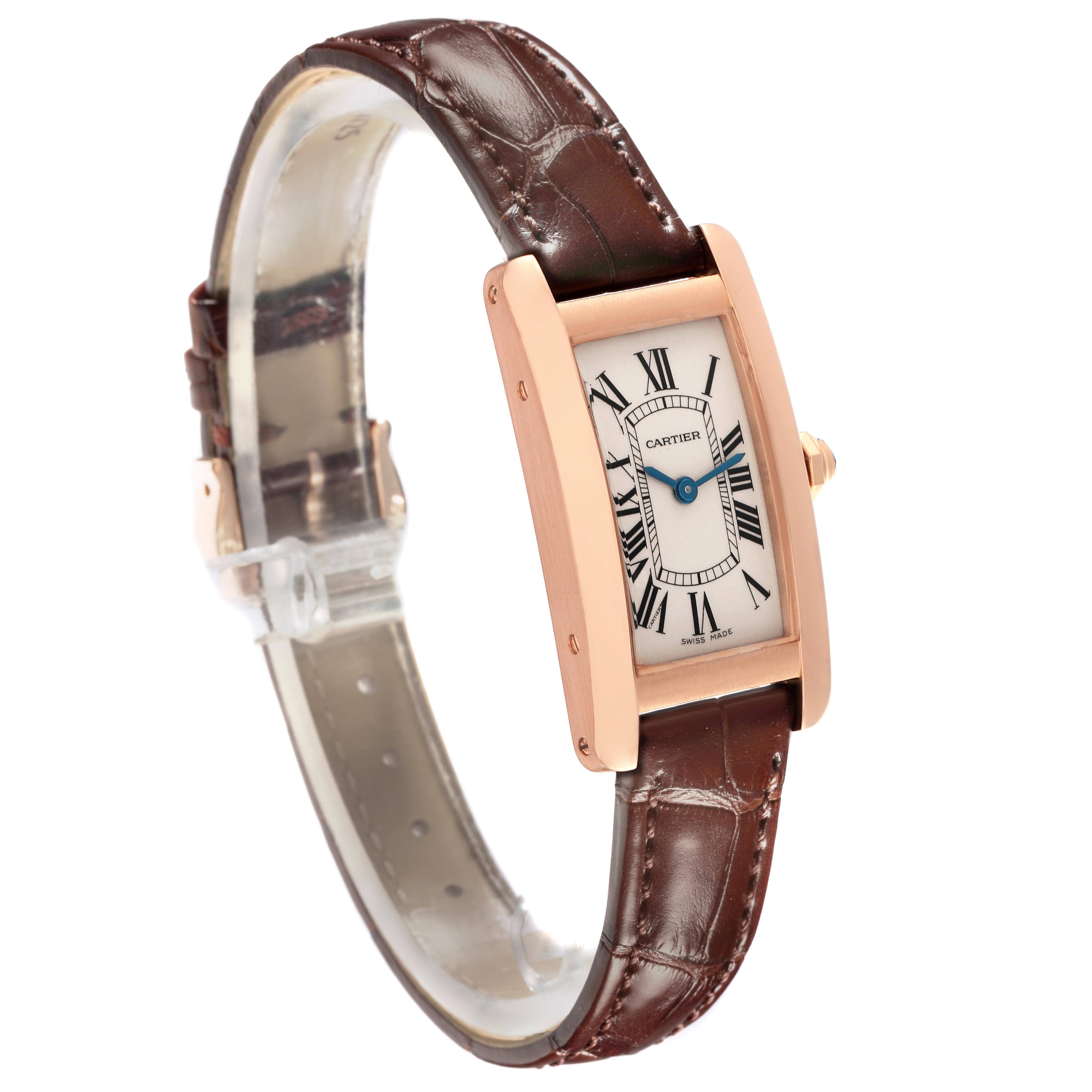 The Cartier Tank Americaine W2607456 Women's Rose Gold Silver Dial W2607456 Women's Rose Gold Silver Dial watch is shown at a three-quarter angle, displaying the face, rose gold case, and brown leather strap.
