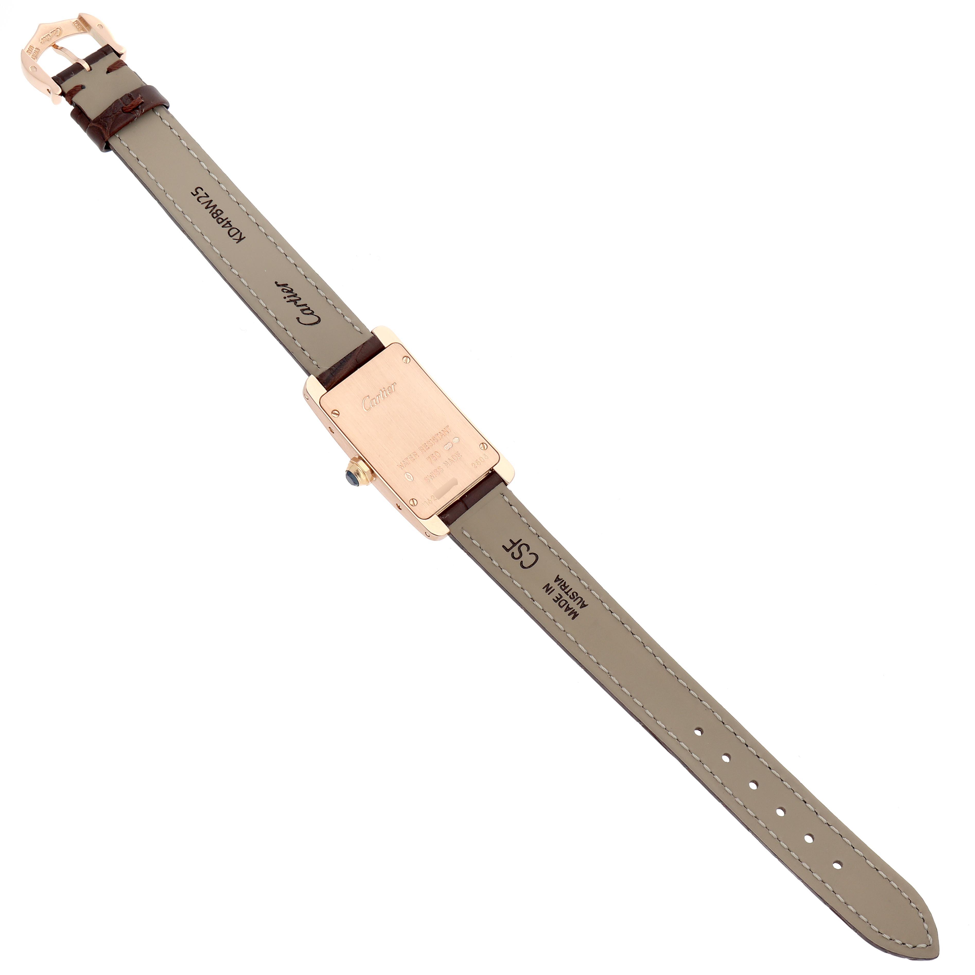 The image shows the back view of a Cartier Tank Américaine watch, displaying the case back and leather strap.