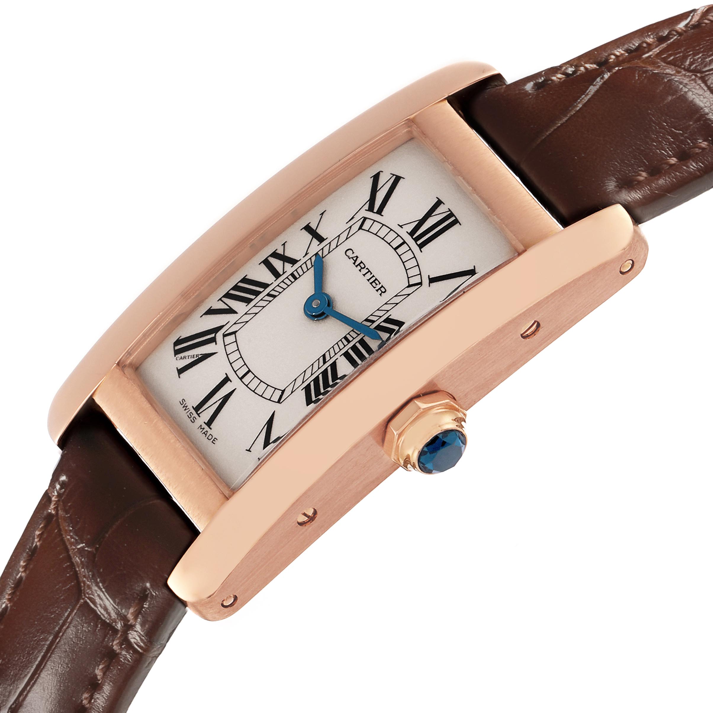 The Cartier Tank Americaine W2607456 Women's Rose Gold Silver Dial W2607456 Women's Rose Gold Silver Dial watch is shown at an angle highlighting the Roman numeral dial, blue hands, crown, and leather strap.
