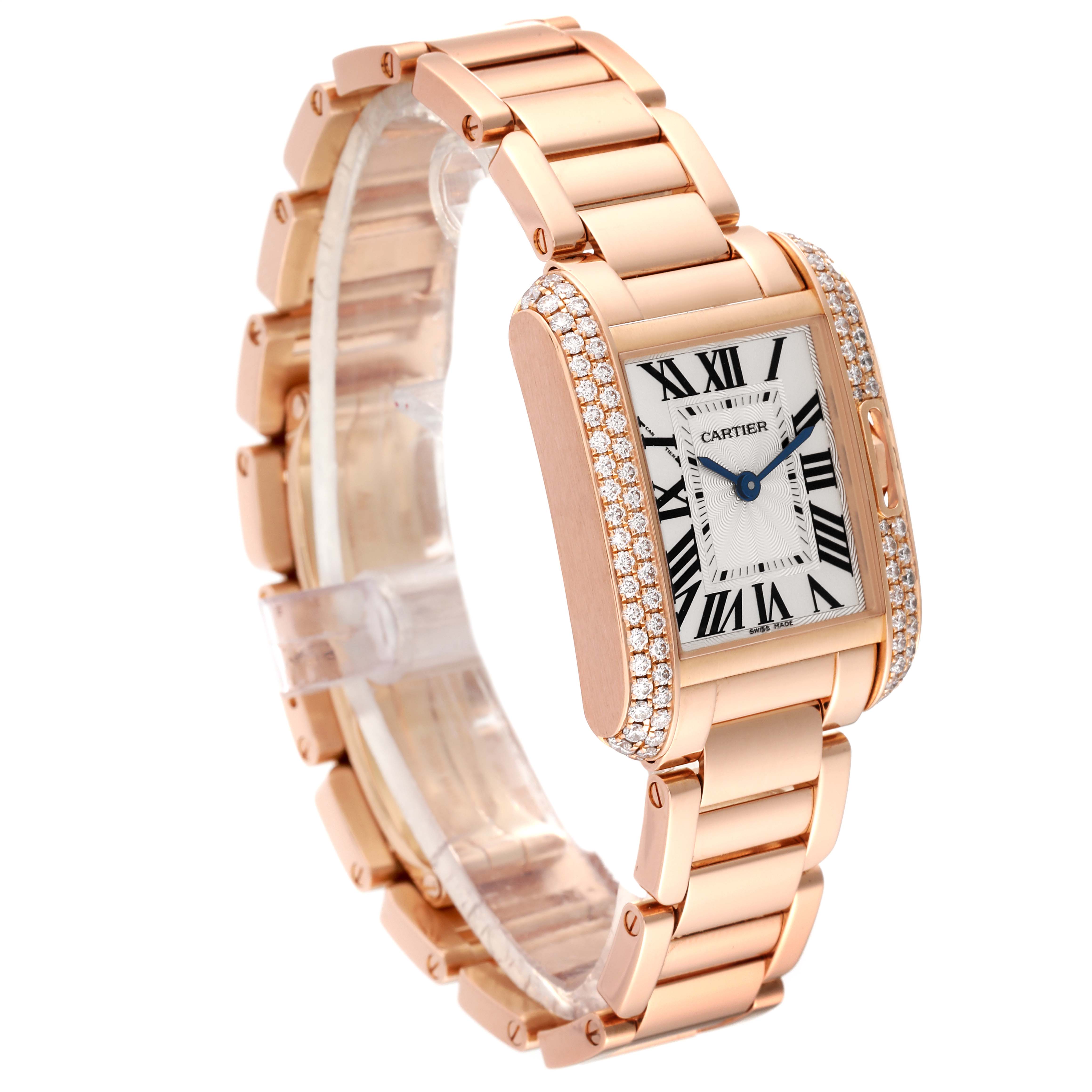 This image shows a gold Cartier Tank Anglaise WT100002 Women's Rose Gold Silver Dial WT100002 Women's Rose Gold Silver Dial watch from a three-quarter angle, highlighting its face, bracelet, and diamond detailing.