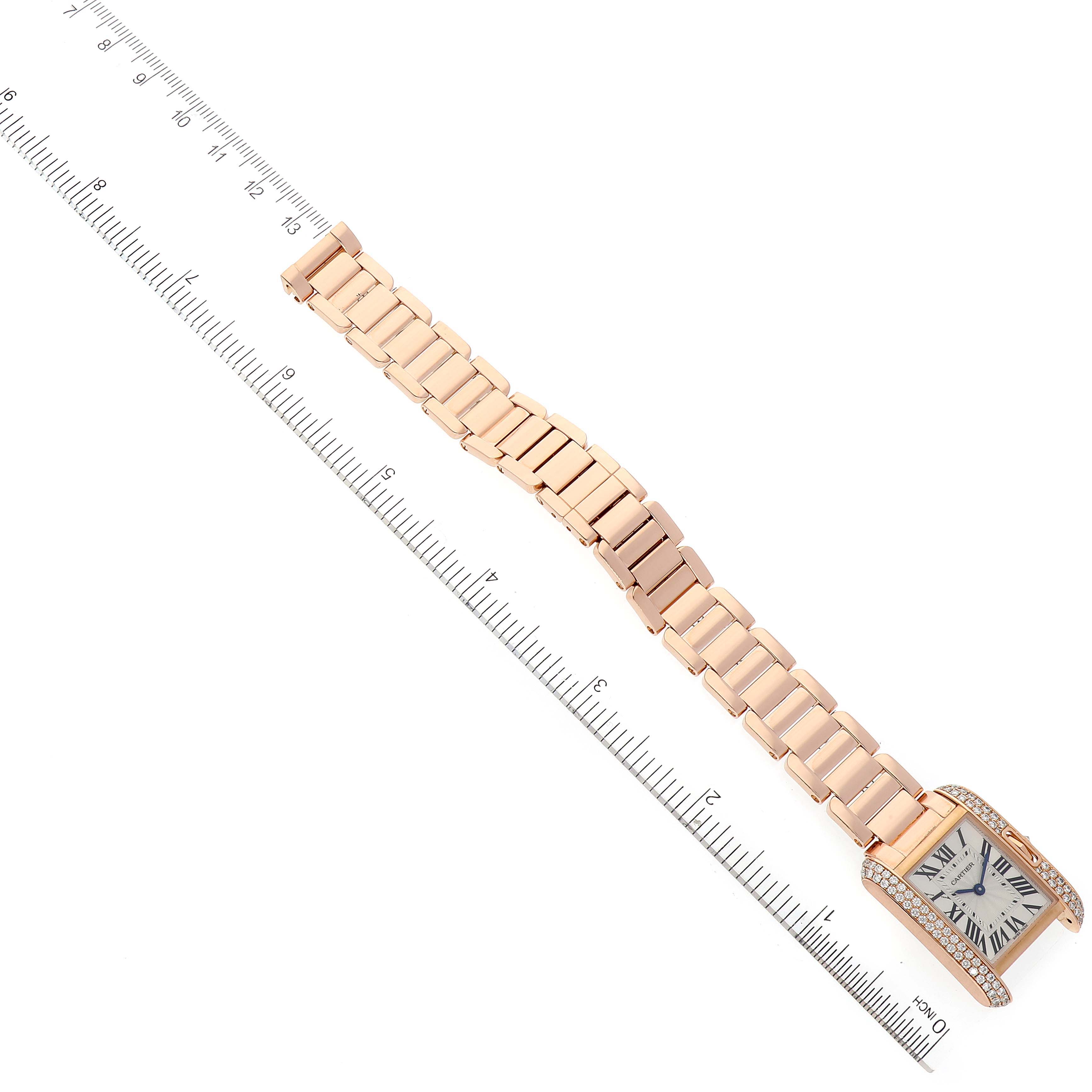 The image shows a top-down view of a Cartier Tank Anglaise WT100002 Women's Rose Gold Silver Dial WT100002 Women's Rose Gold Silver Dial watch, fully extended with a ruler for scale.