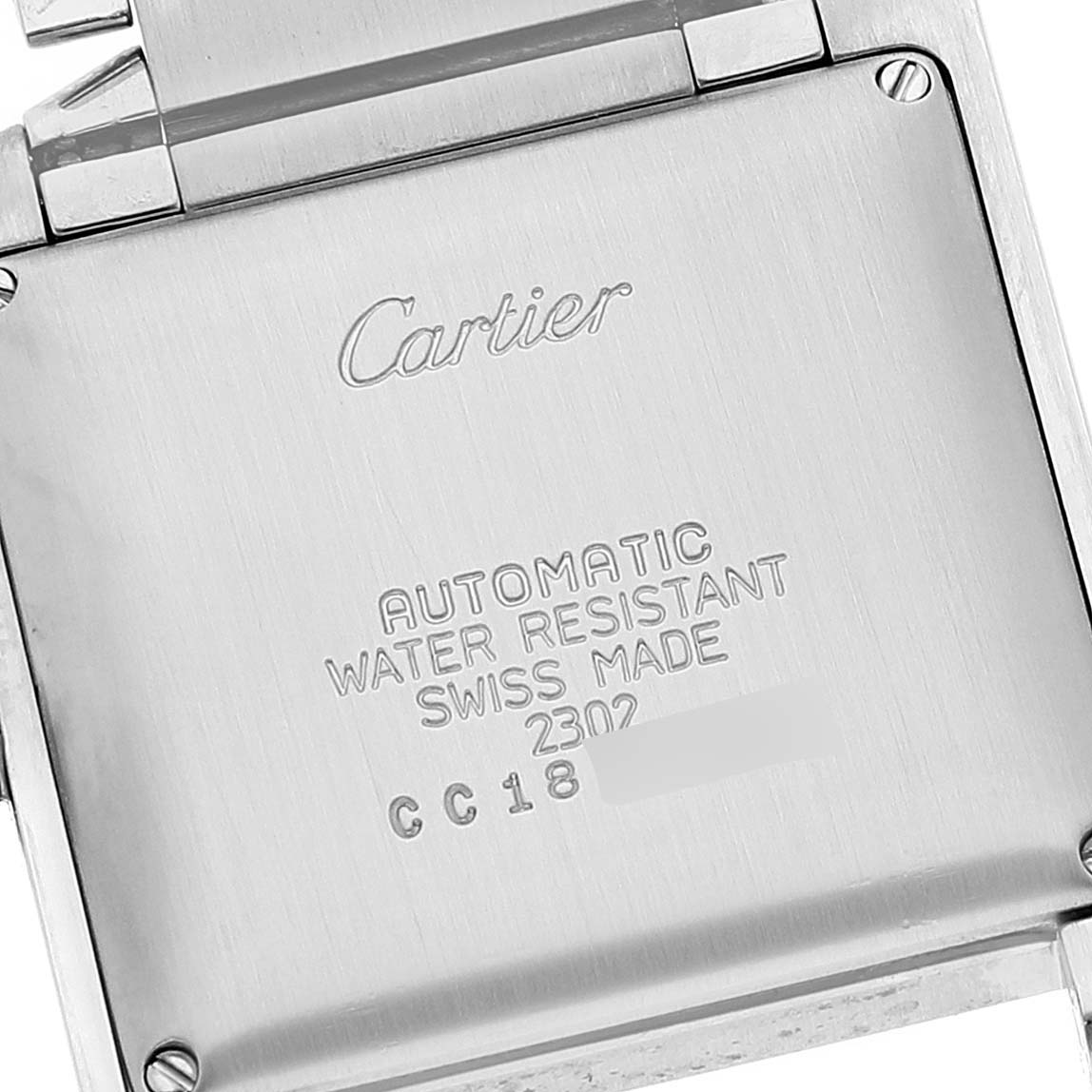 The image shows the case back of the Cartier Tank Francaise W51002Q3 Men's Stainless Steel Silver Dial W51002Q3 Men's Stainless Steel Silver Dial watch, displaying engraving details about its specifications.