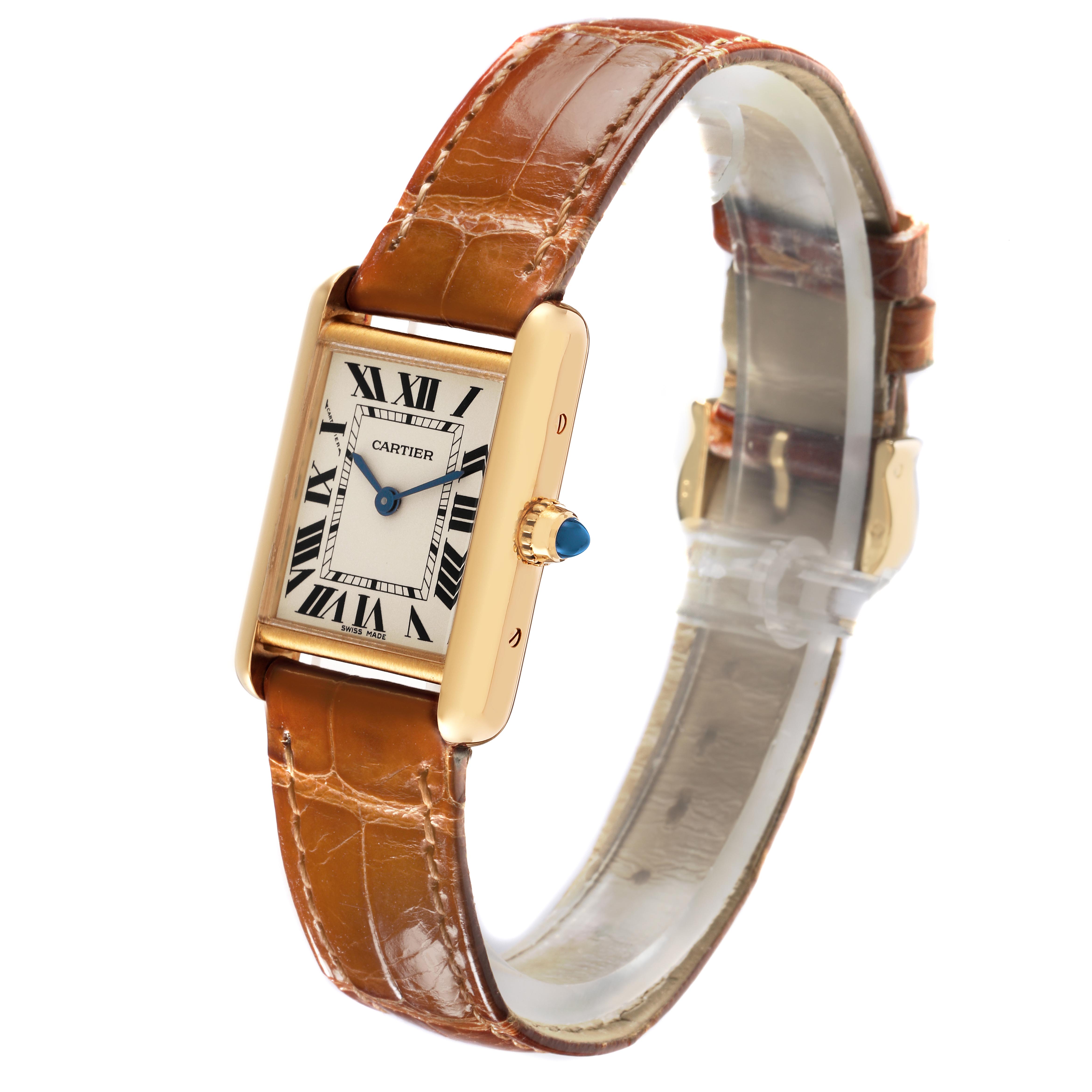 The Cartier Tank Louis W1529856 Women's Yellow Gold Silver Dial W1529856 Women's Yellow Gold Silver Dial watch is shown at a slight angle, displaying the rectangular case, dial, crown, and brown leather strap.