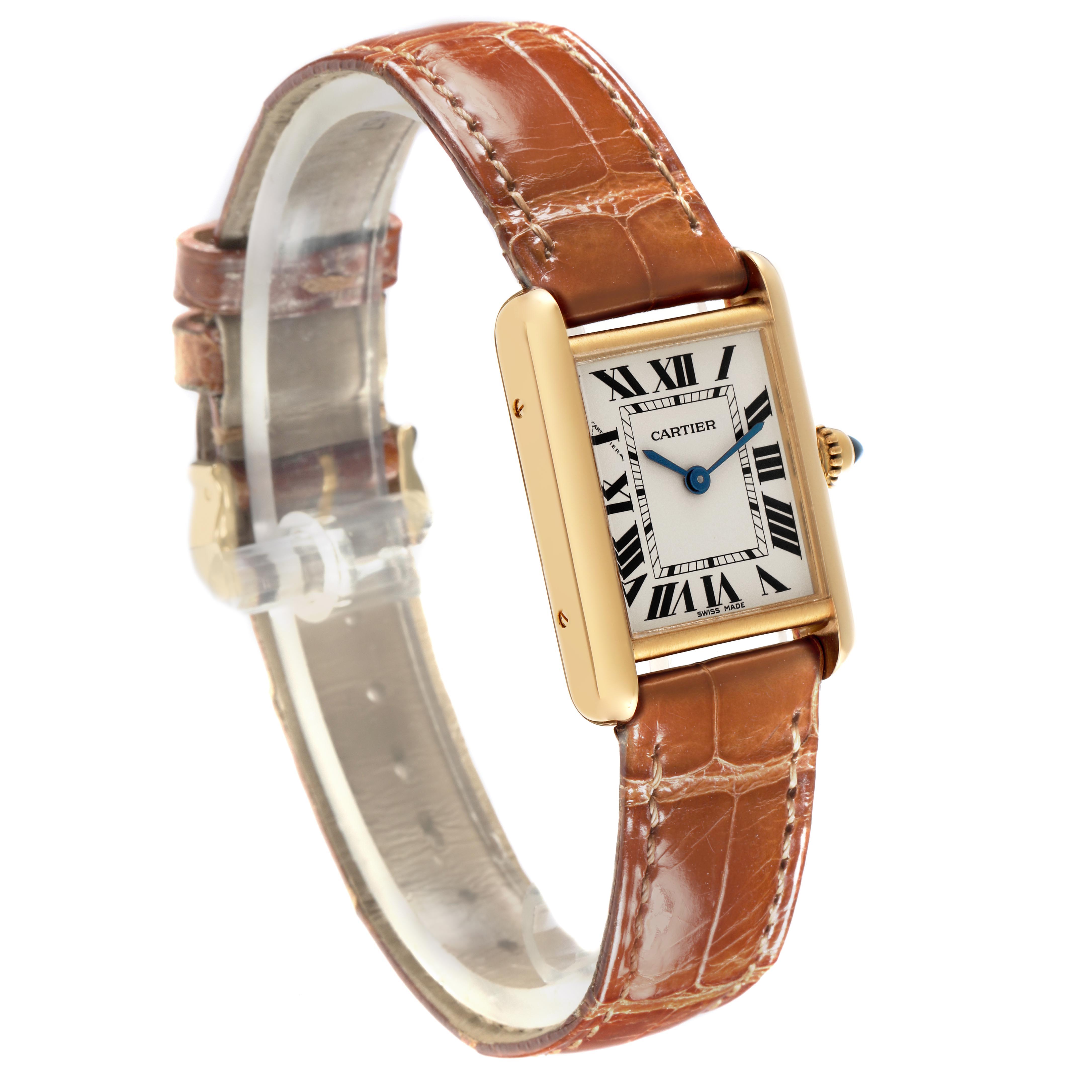 The Cartier Tank Louis W1529856 Women's Yellow Gold Silver Dial W1529856 Women's Yellow Gold Silver Dial watch is shown at a three-quarter angle, displaying the face, strap, and side profile with the crown.
