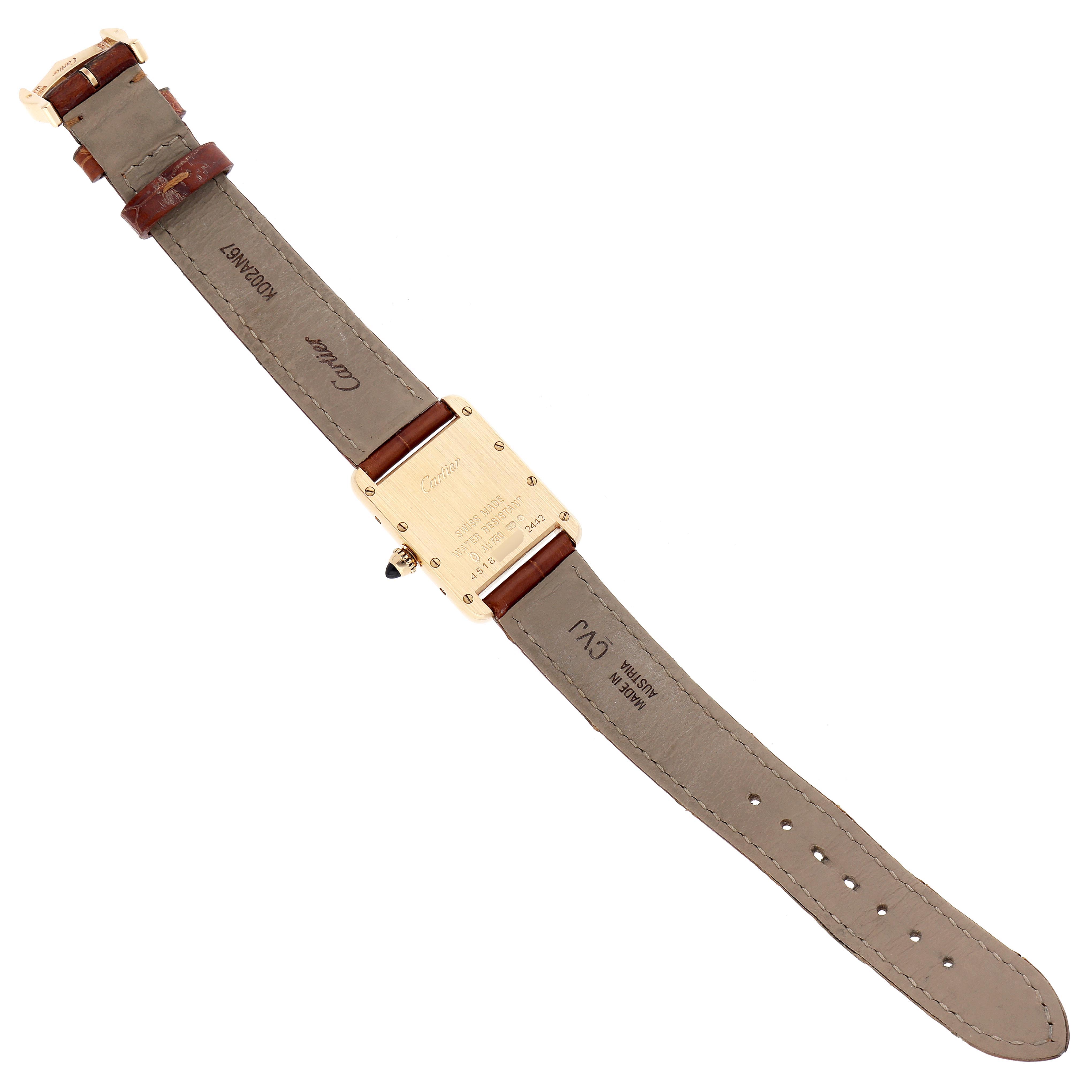 The image shows the back view of the Cartier Tank Louis W1529856 Women's Yellow Gold Silver Dial W1529856 Women's Yellow Gold Silver Dial watch, highlighting the case back and leather strap details.