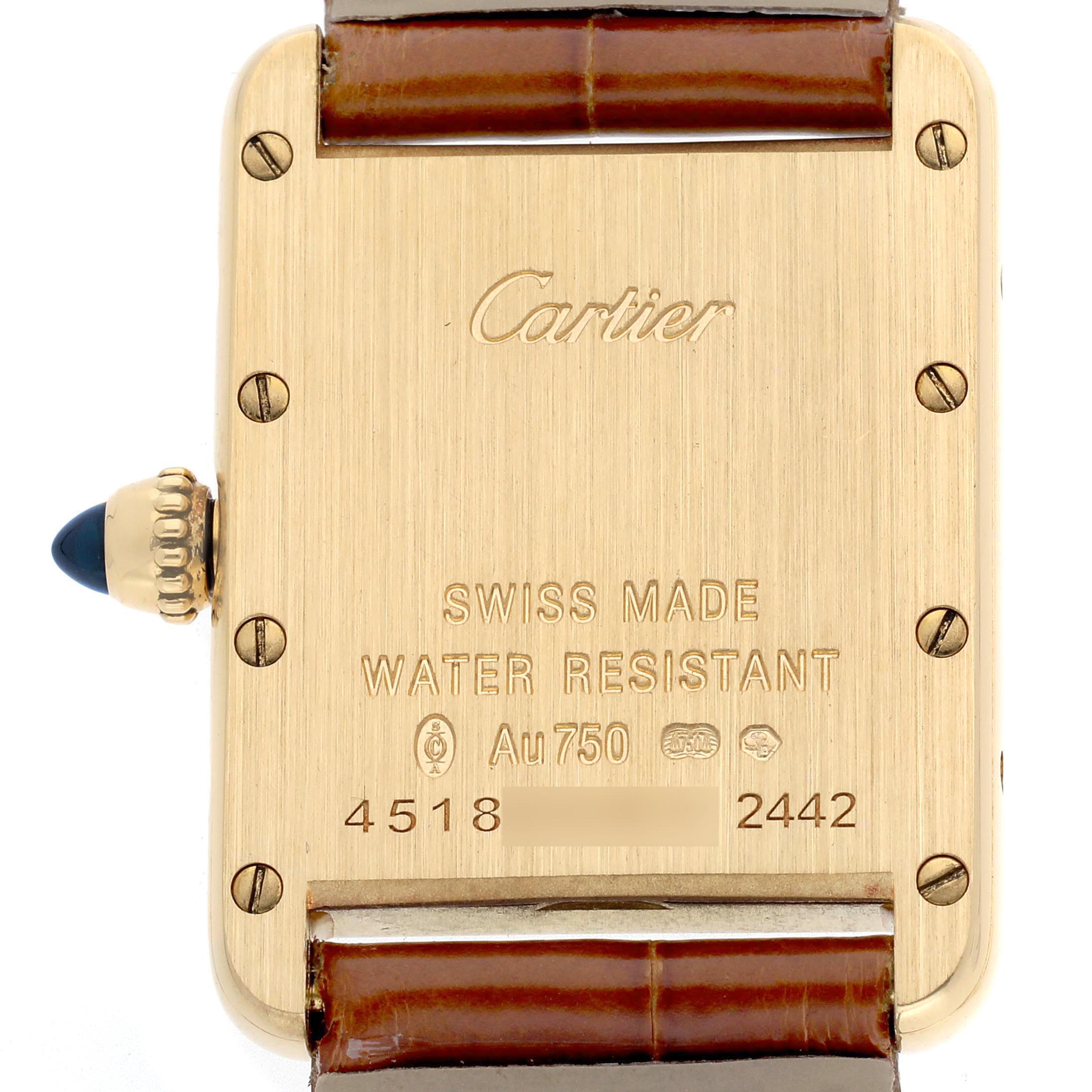 The image shows the back of a Cartier Tank Louis W1529856 Women's Yellow Gold Silver Dial W1529856 Women's Yellow Gold Silver Dial watch with engravings and a visible crown.