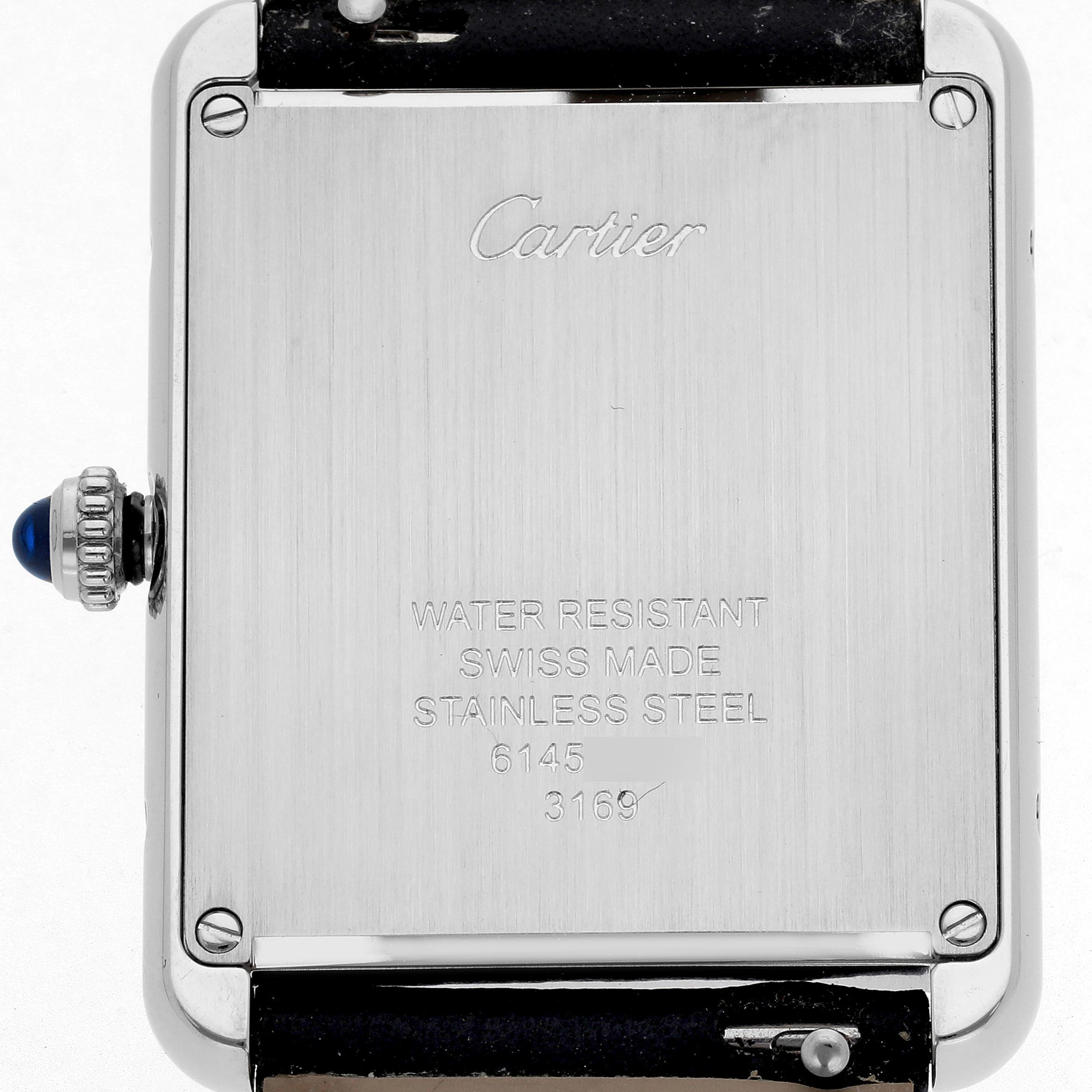 The image shows the back case of a Cartier Tank Solo WSTA0028 Men's Stainless Steel Silver Dial WSTA0028 Men's Stainless Steel Silver Dial watch, highlighting its water resistance and stainless steel details.