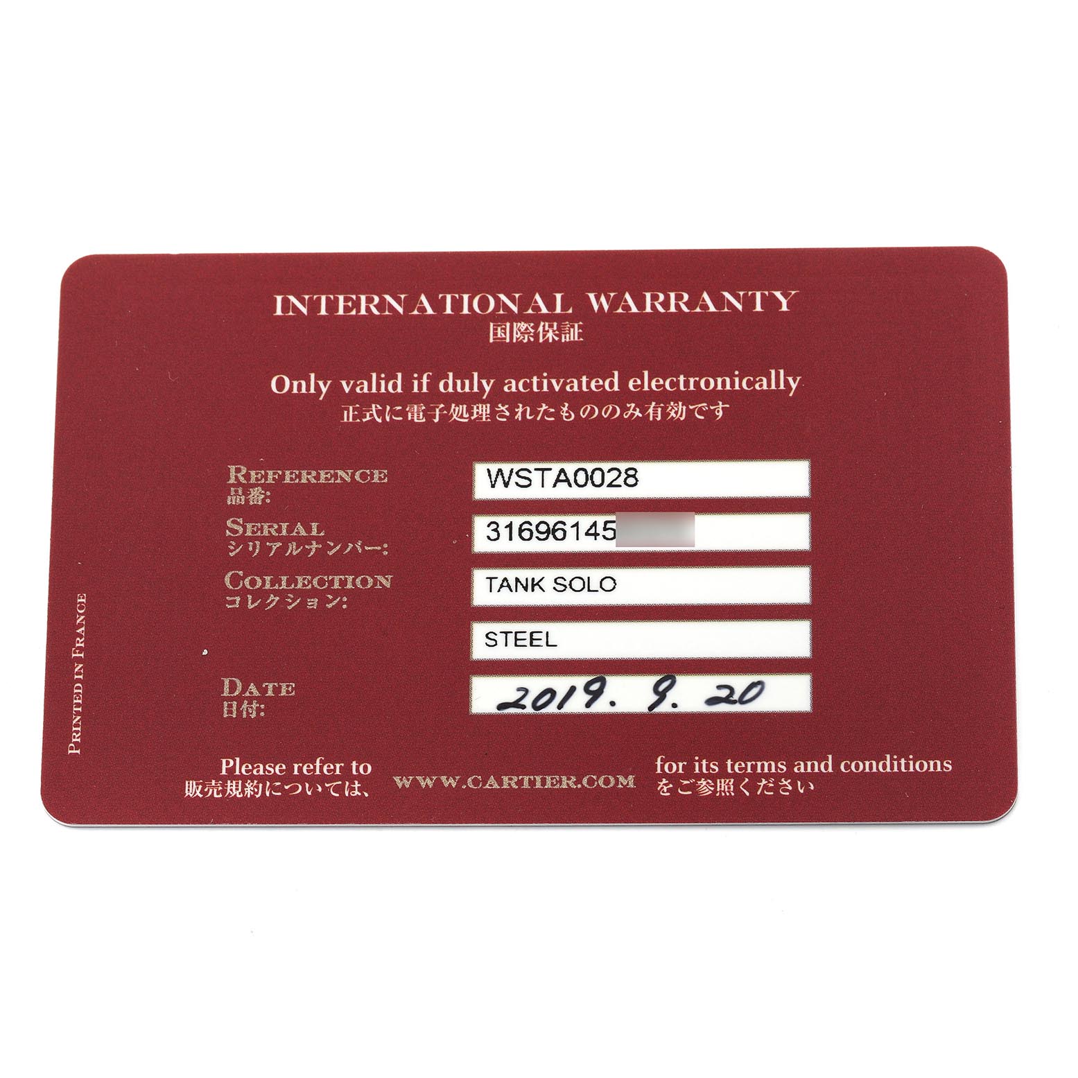 The image shows an International Warranty card for the Cartier Tank Solo WSTA0028 Men's Stainless Steel Silver Dial WSTA0028 Men's Stainless Steel Silver Dial watch, detailing reference, serial number, and date.