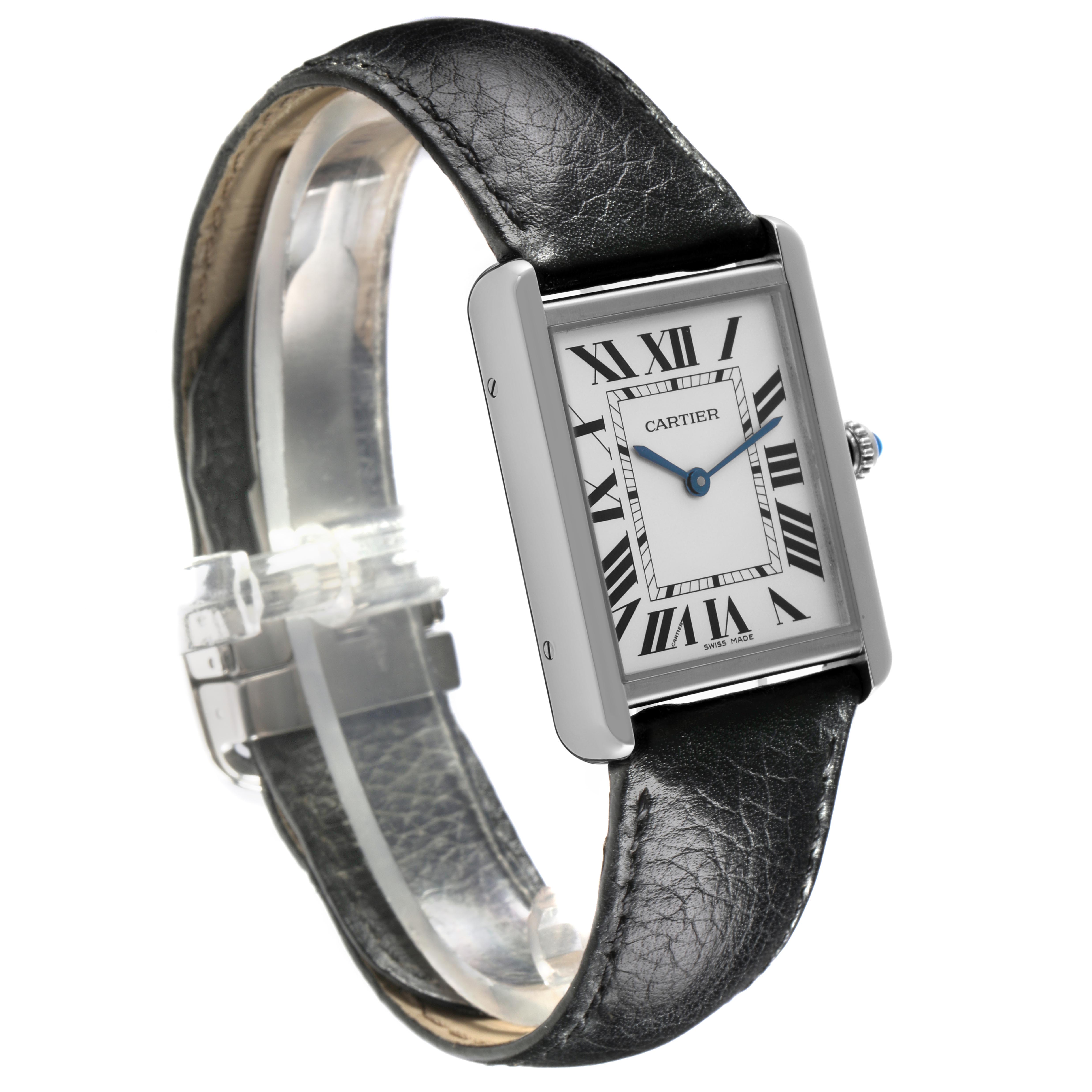 The Cartier Tank Solo WSTA0028 Men's Stainless Steel Silver Dial WSTA0028 Men's Stainless Steel Silver Dial watch is shown at an angled side view, displaying its rectangular face, Roman numerals, and black leather strap.