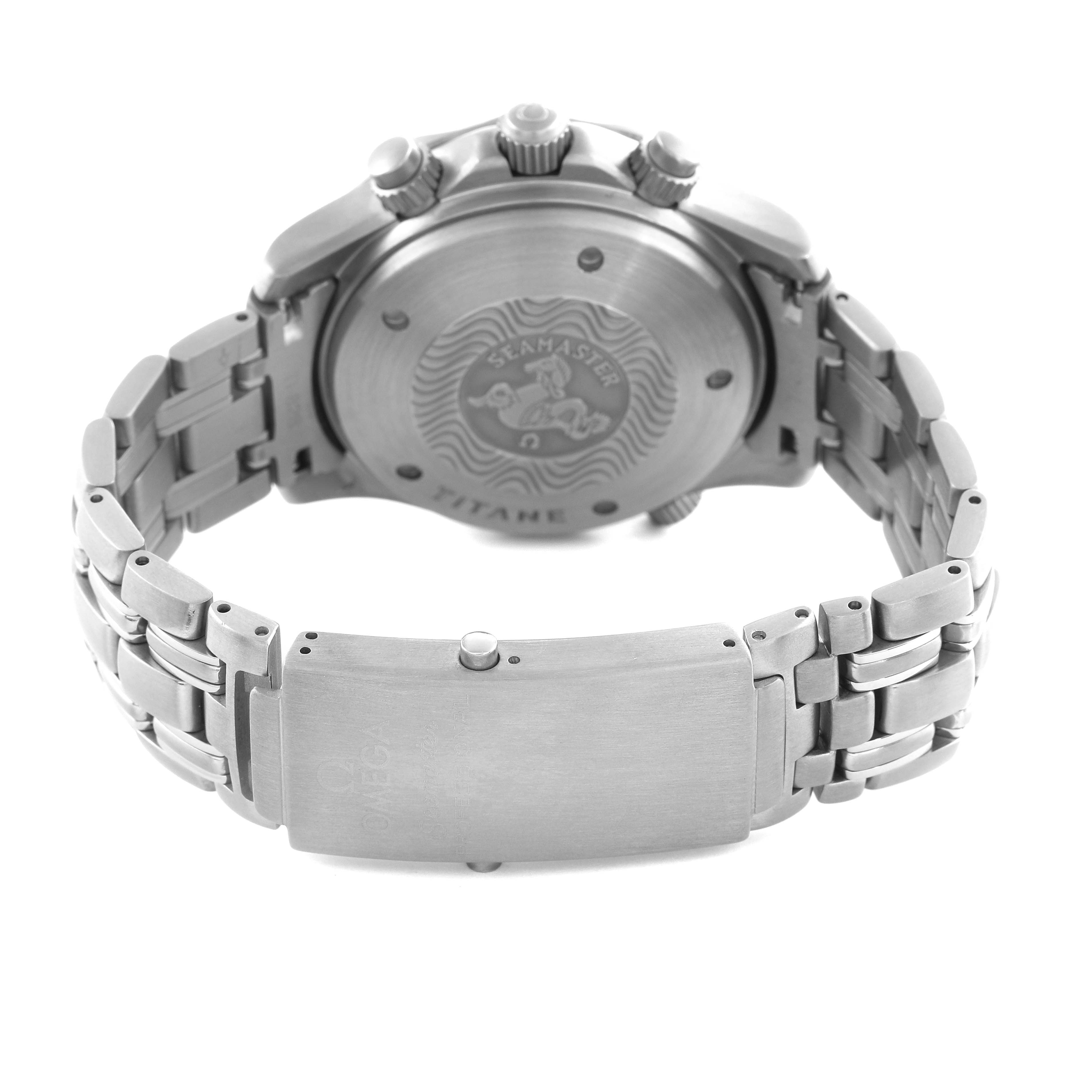 The Omega Seamaster 2298.80.00 Men's Titanium Blue Dial 2298.80.00 Men's Titanium Blue Dial watch is shown from the back, displaying the case back, clasp, and part of the bracelet.