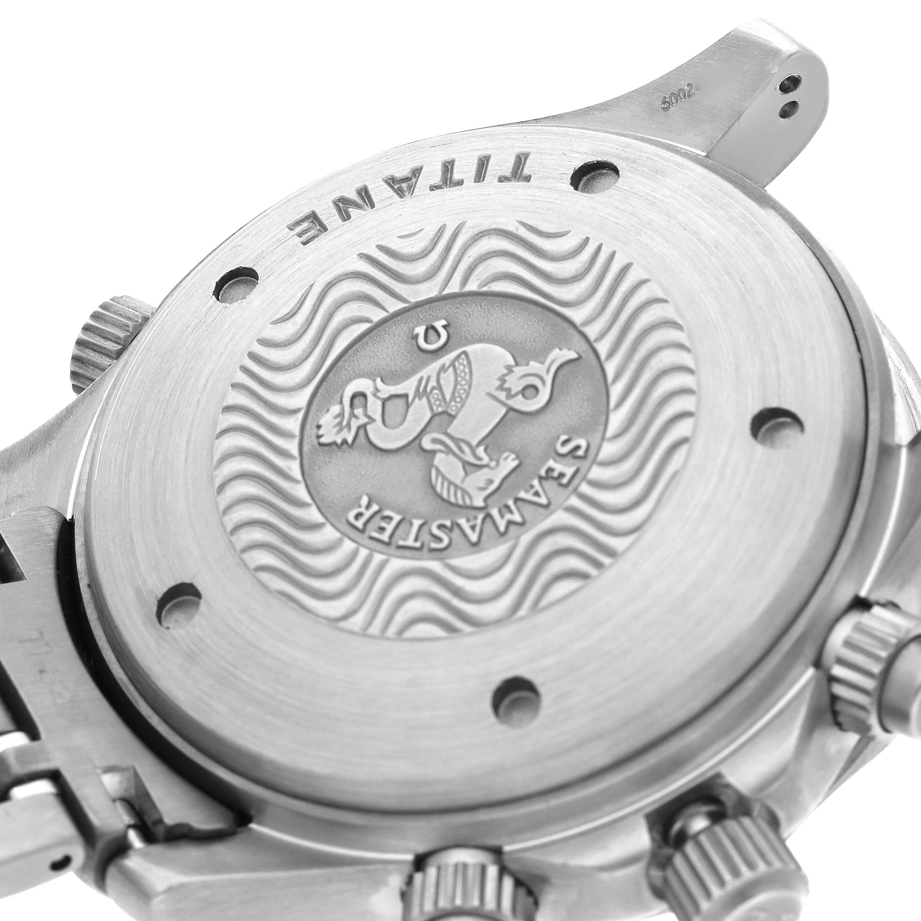 The image shows the backside of an Omega Seamaster 2298.80.00 Men's Titanium Blue Dial 2298.80.00 Men's Titanium Blue Dial watch with details of the case back, bracelet, and crowns visible.