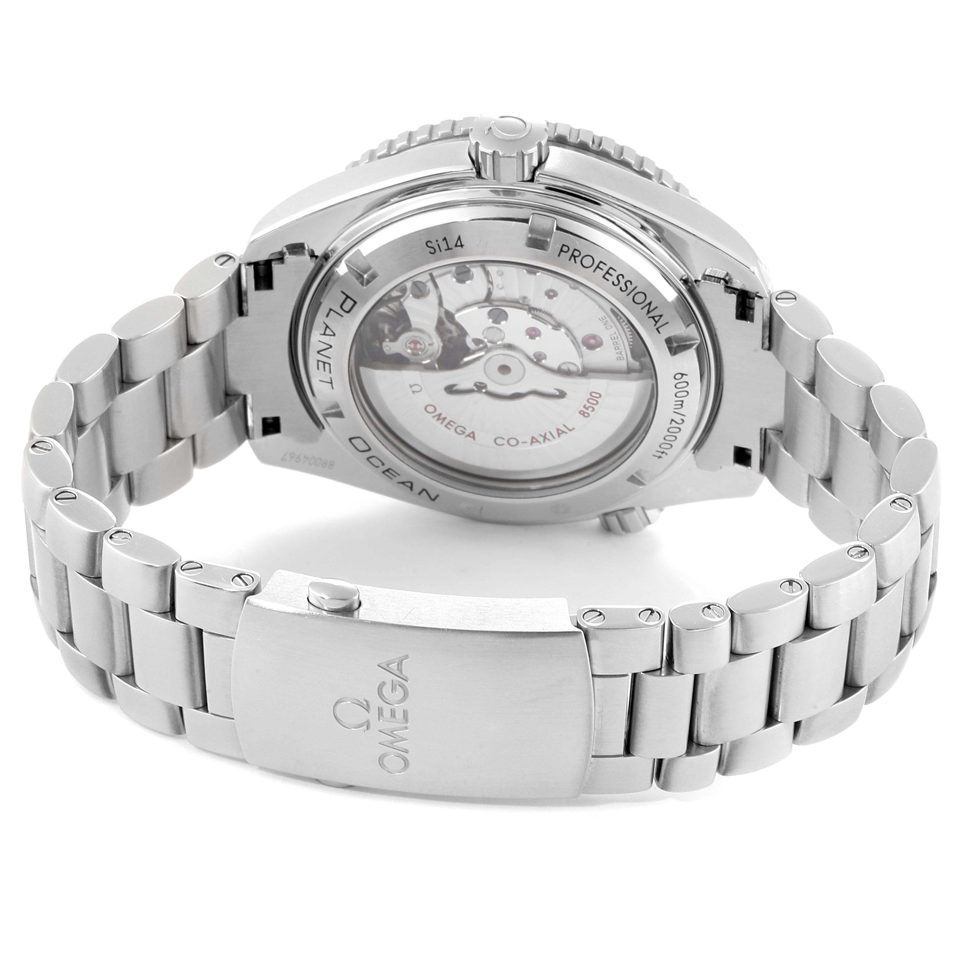 The image shows the back view of an Omega Seamaster 232.30.46.21.01.001 Men
s Stainless Steel Black Dial 232.30.46.21.01.001 Men
s Stainless Steel Black Dial watch with its bracelet and the transparent case back displaying the movement.