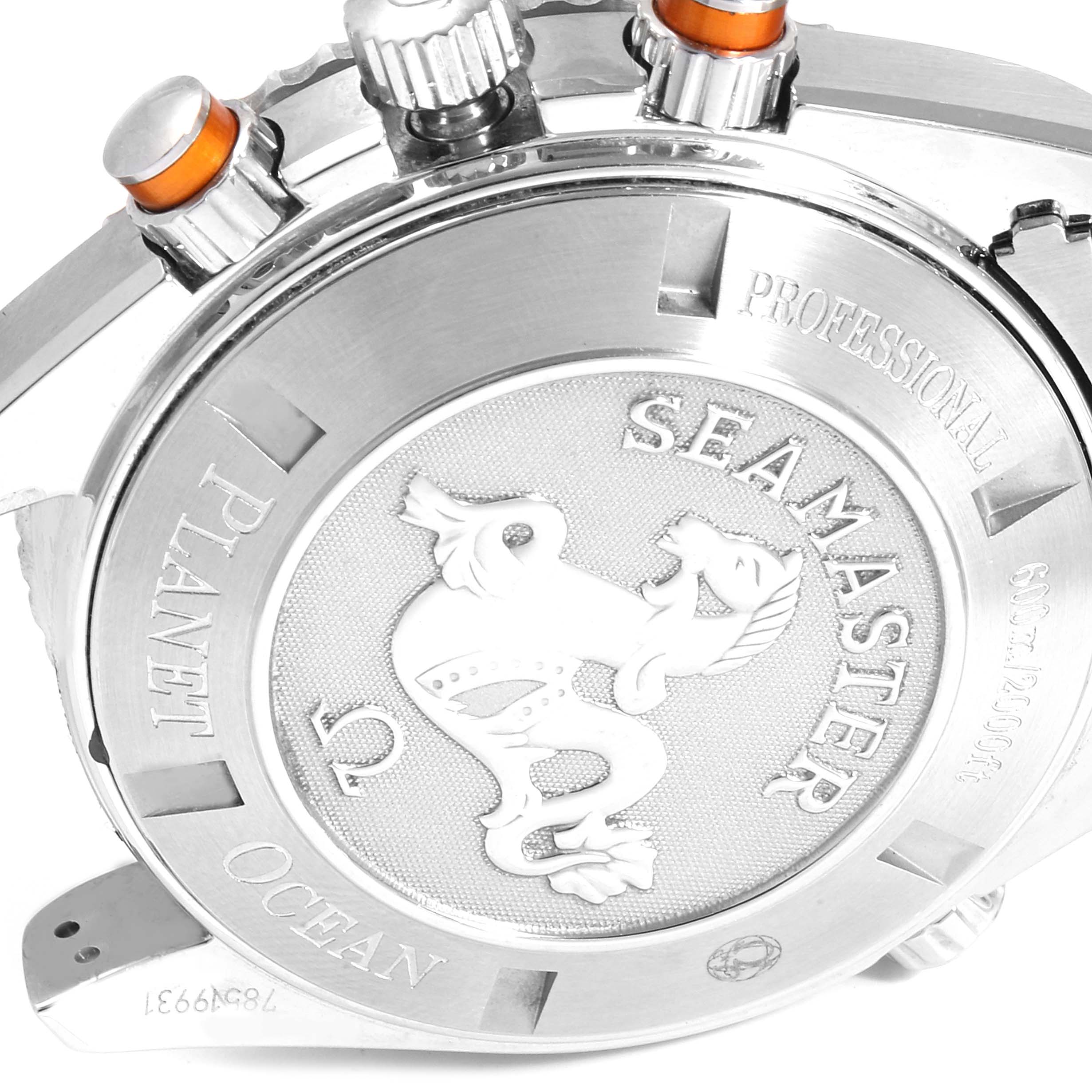 The image shows the back case and part of the crown of the Omega Planet Ocean 2218.50.00 Men
s Stainless Steel Black Dial 2218.50.00 Men
s Stainless Steel Black Dial watch, highlighting the "Seamaster" engraving.