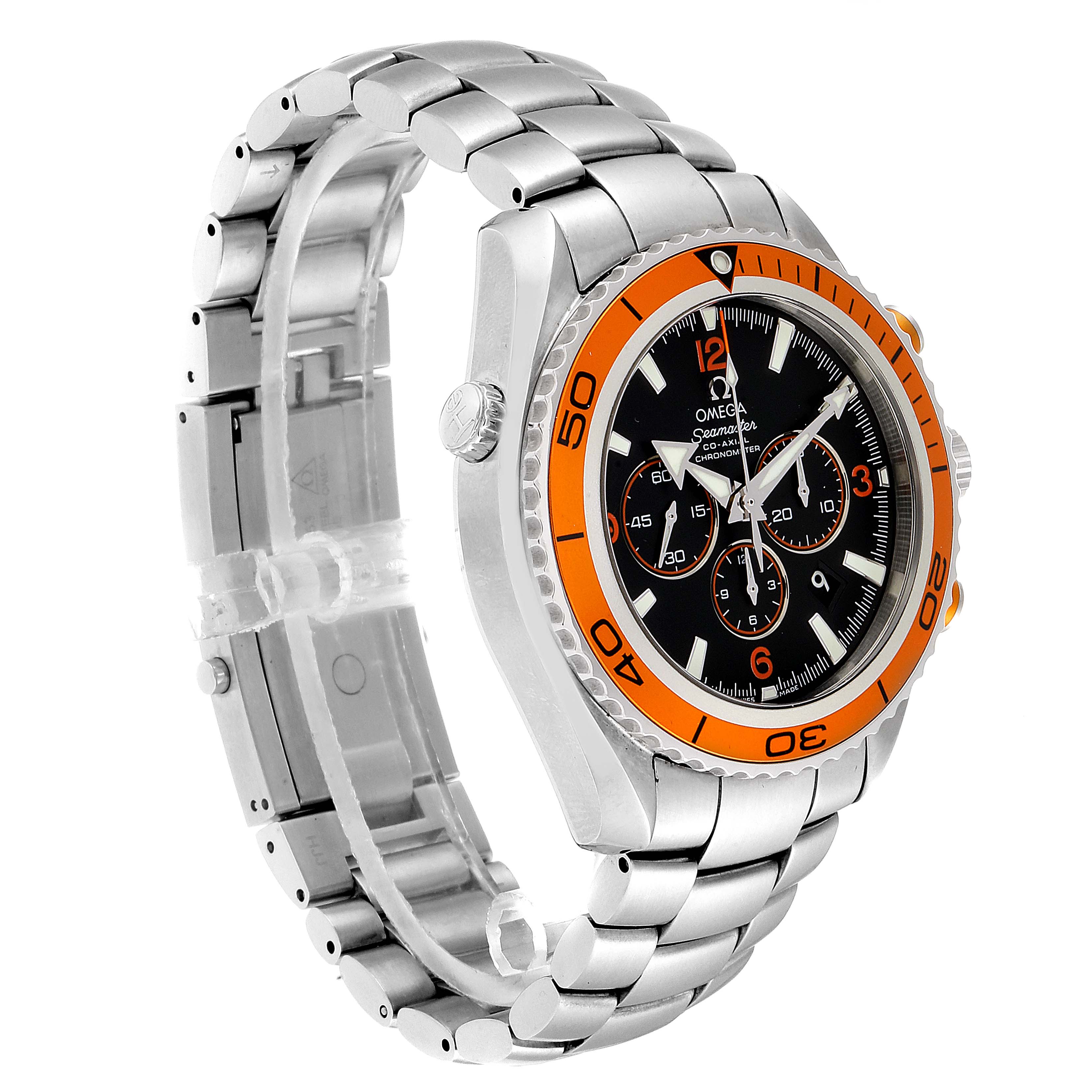The image shows an Omega Planet Ocean 2218.50.00 Men
s Stainless Steel Black Dial 2218.50.00 Men
s Stainless Steel Black Dial watch at an angle, highlighting its orange bezel, black dial, and stainless steel bracelet.