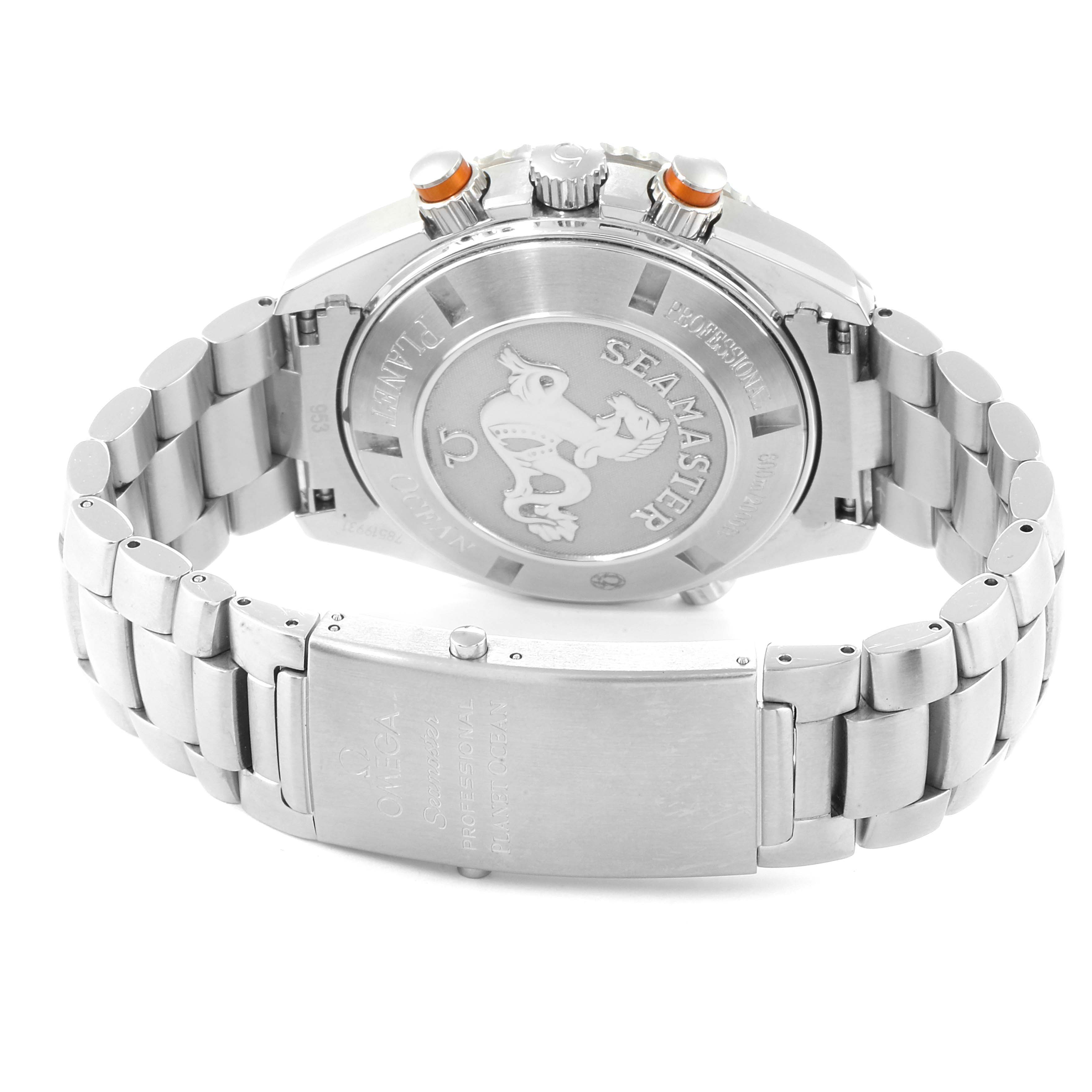 The image shows the back and clasp of the Omega Seamaster Planet Ocean watch, highlighting the case back and stainless steel bracelet.