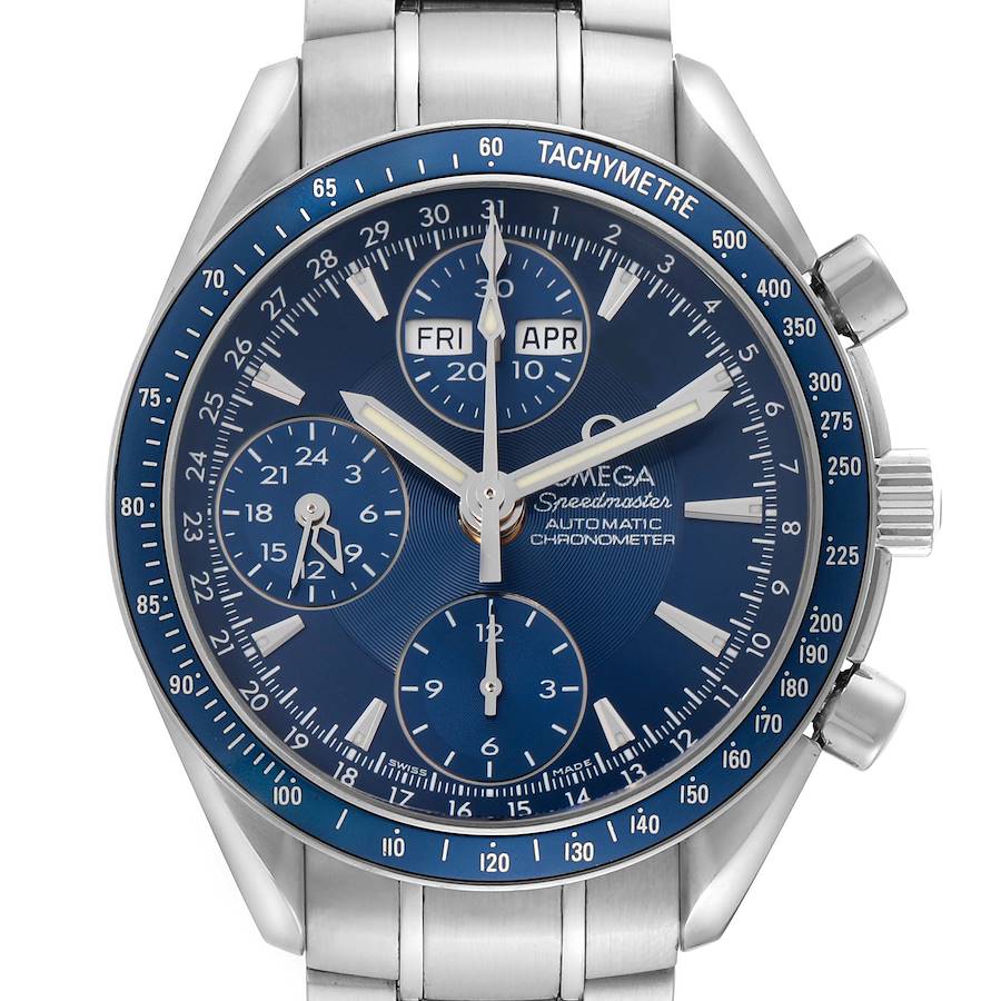 The Omega Speedmaster watch is shown from the front, highlighting the blue dial, sub-dials, tachymeter, and stainless steel bracelet.