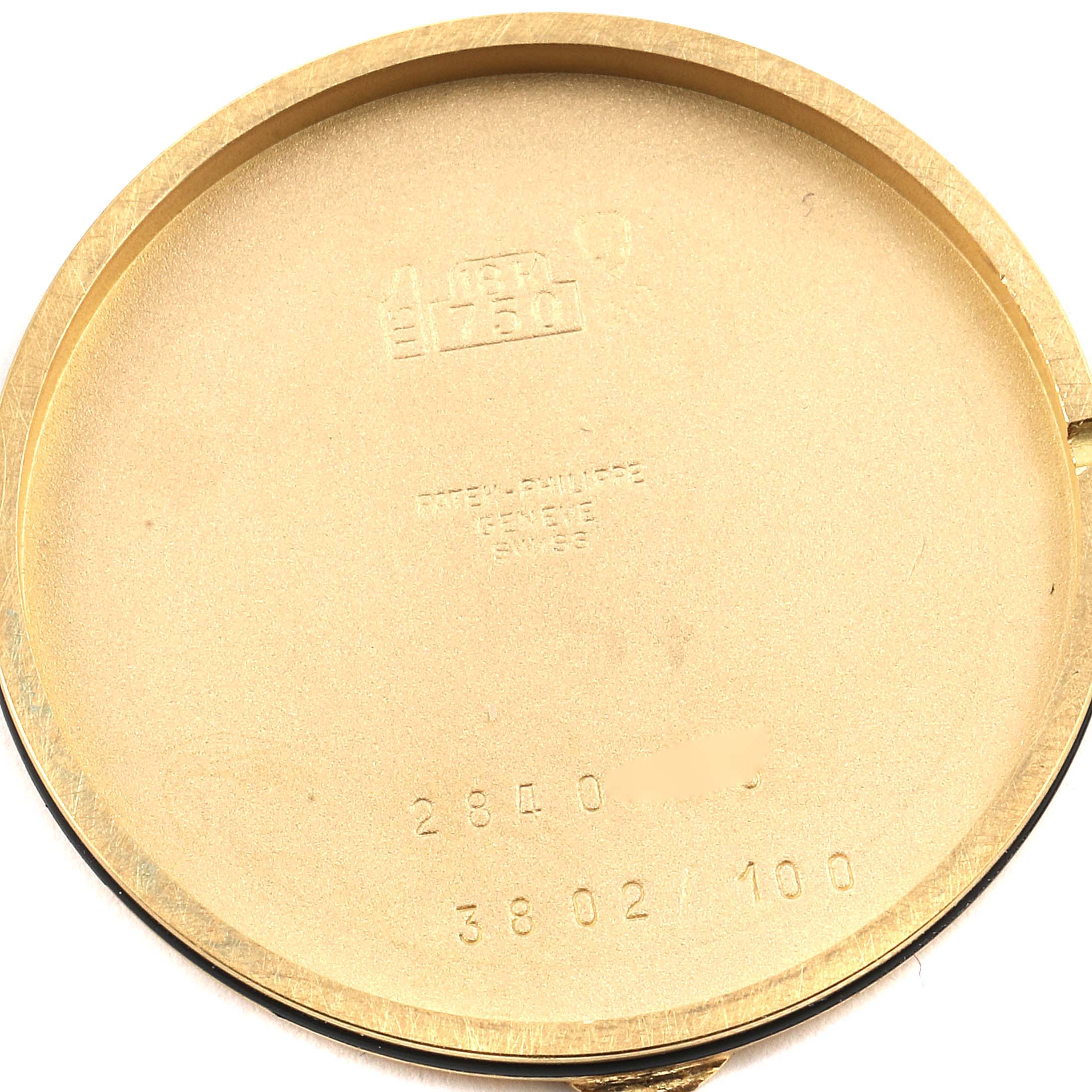 The image shows the inside of the case back of a Patek Philippe Calatrava 3802G Men's Yellow Gold White Dial 3802G Men's Yellow Gold White Dial watch.