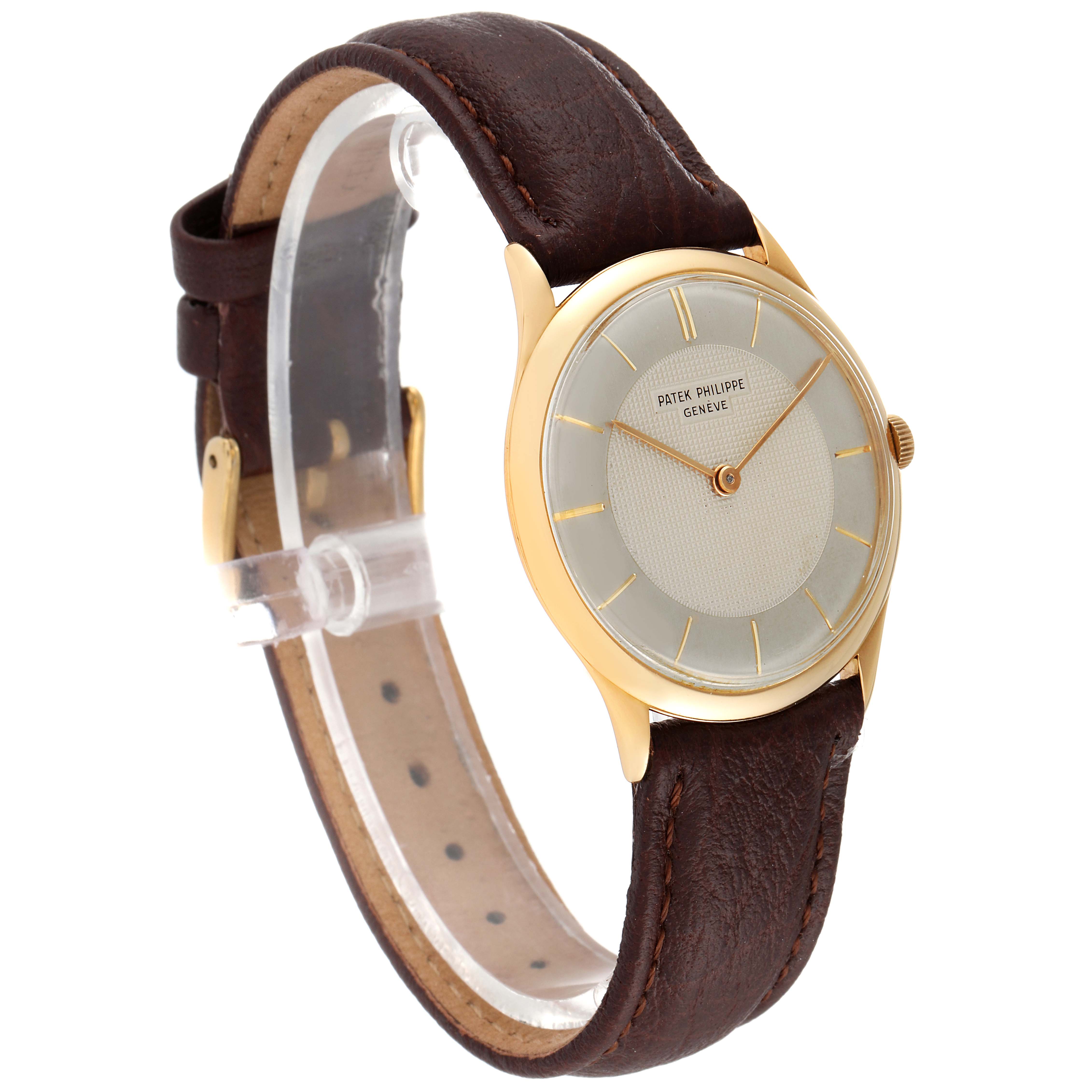 The Patek Philippe Calatrava 2507 Men's Yellow Gold Silver Dial 2507 Men's Yellow Gold Silver Dial watch is shown from a side angle, highlighting the dial, case, and leather strap.