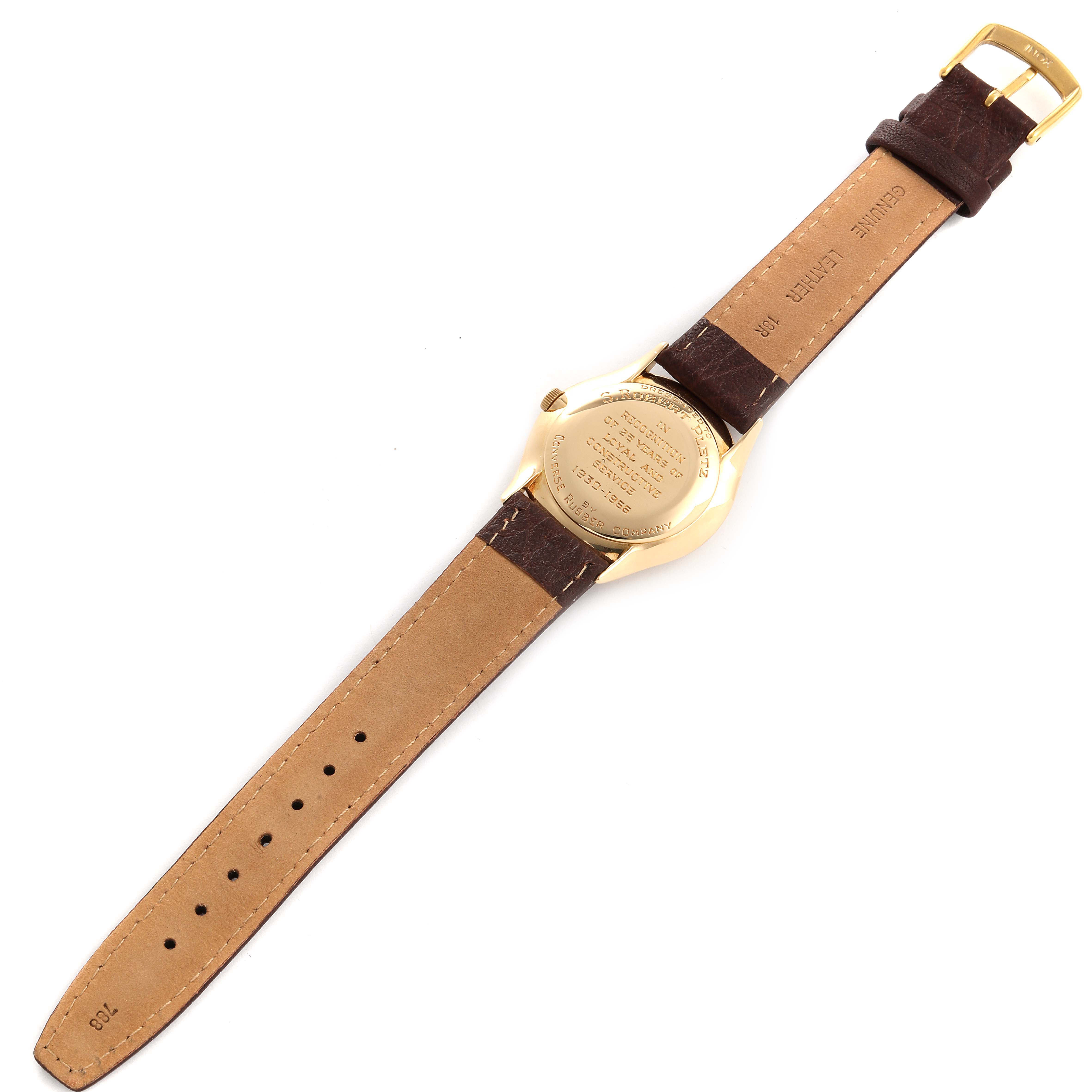 This image shows the back and strap of a Patek Philippe Calatrava 2507 Men's Yellow Gold Silver Dial 2507 Men's Yellow Gold Silver Dial watch from an overhead angle.