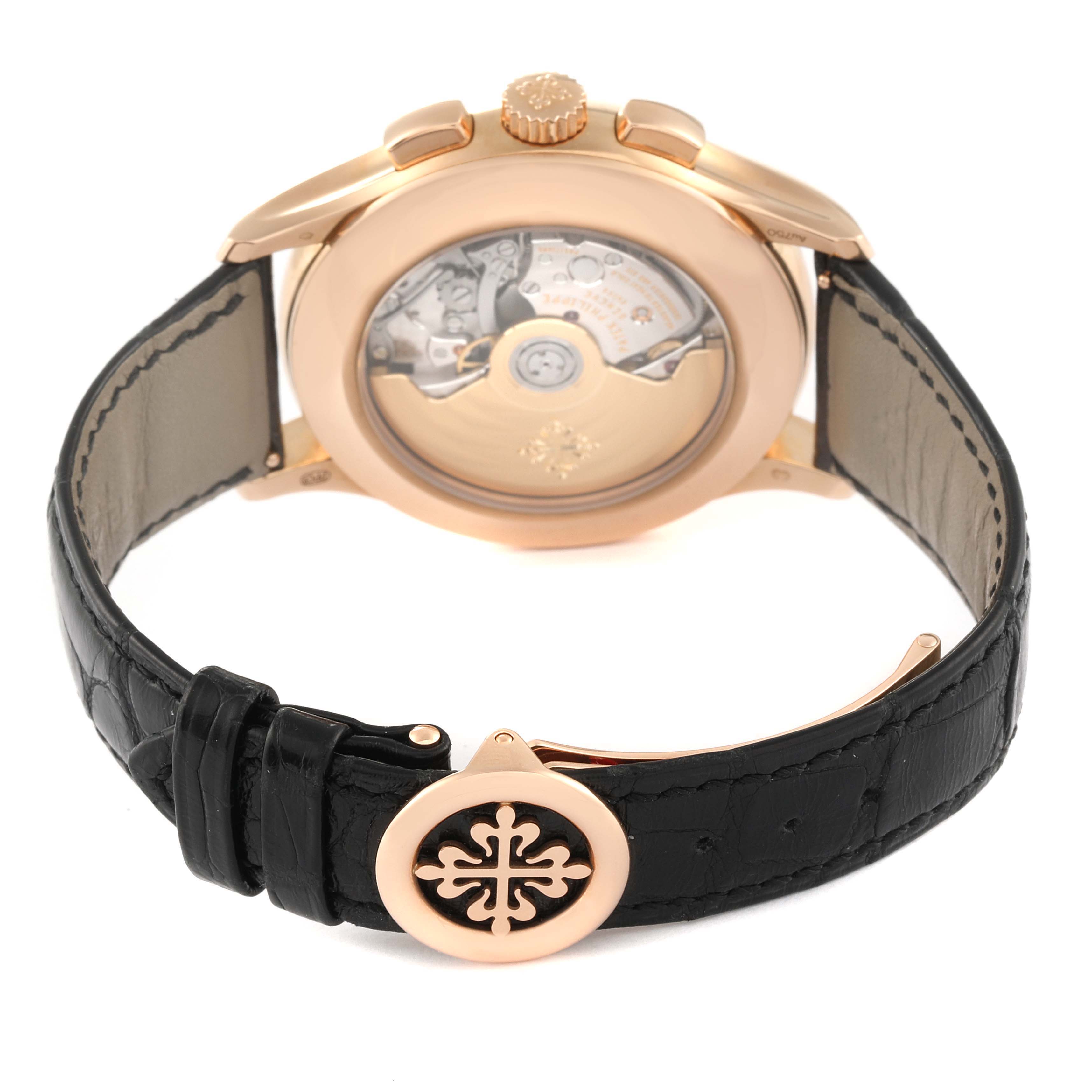 The image shows the back view of a Patek Philippe Complications 5905R - 001 Men's Rose Gold Brown Dial 5905R - 001 Men's Rose Gold Brown Dial watch, highlighting its movement and black leather strap.