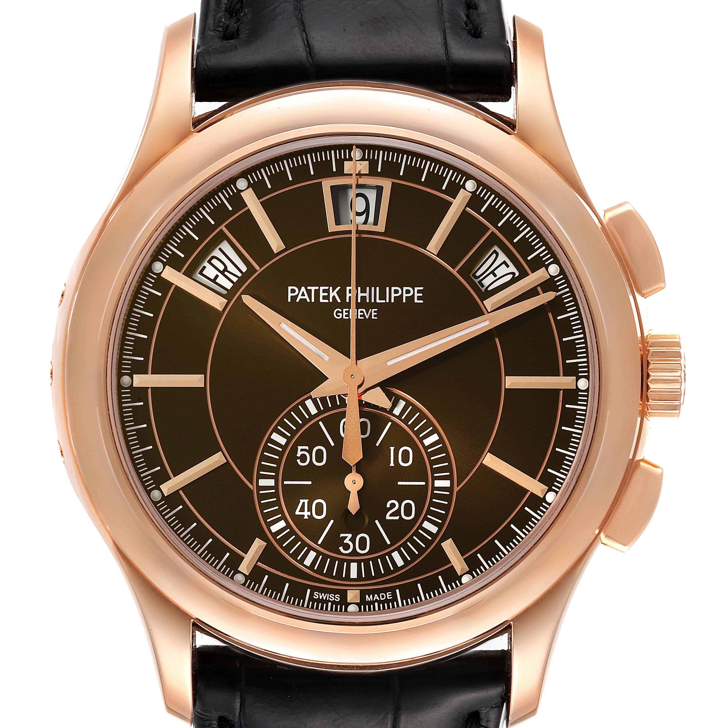 The image shows a front view of the Patek Philippe Complications 5905R - 001 Men's Rose Gold Brown Dial 5905R - 001 Men's Rose Gold Brown Dial model watch, highlighting its dial, hands, and leather strap.