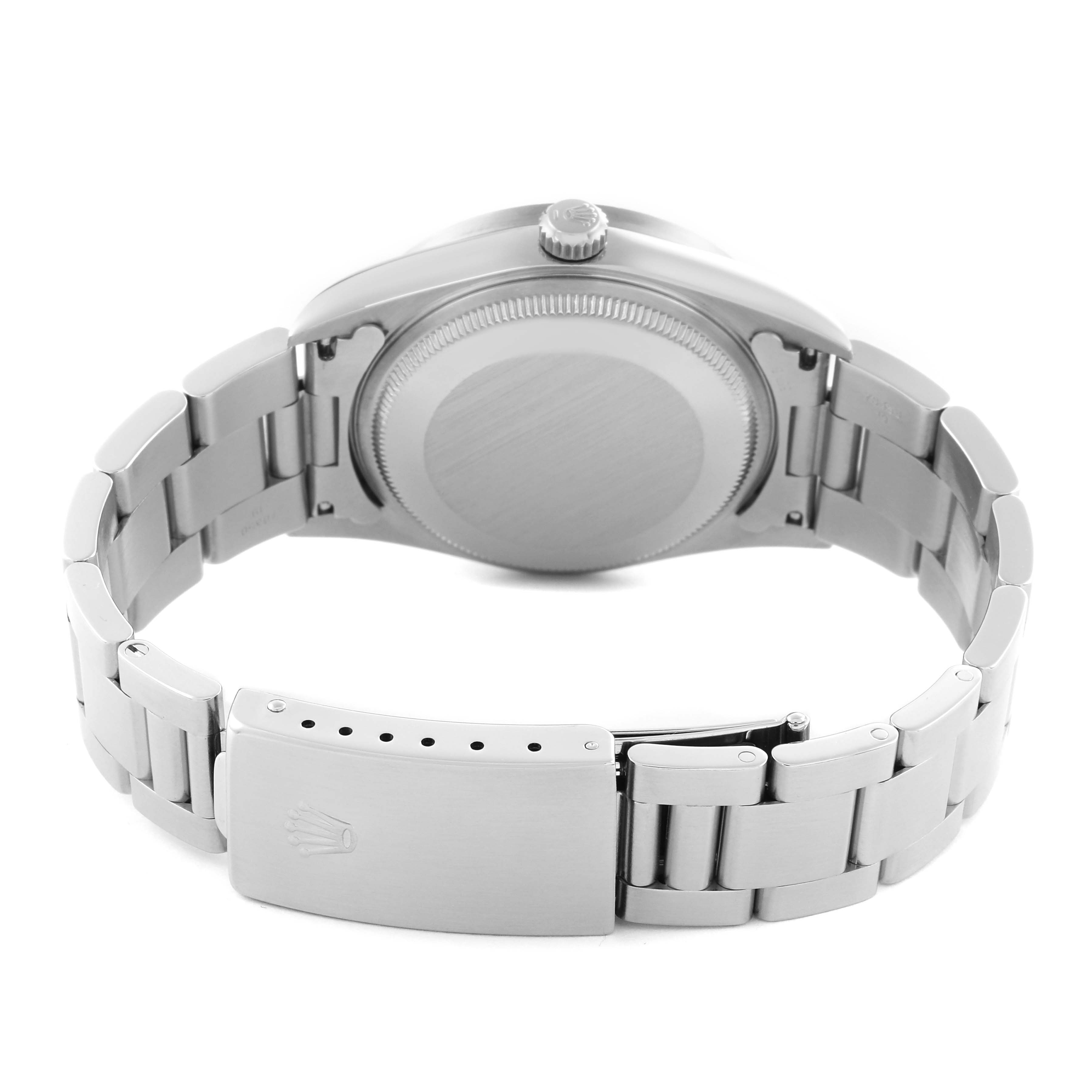 The image shows the backside and bracelet of a Rolex Air-King 14010 Men's Stainless Steel Pink Dial 14010 Men's Stainless Steel Pink Dial watch, highlighting the clasp and case back.