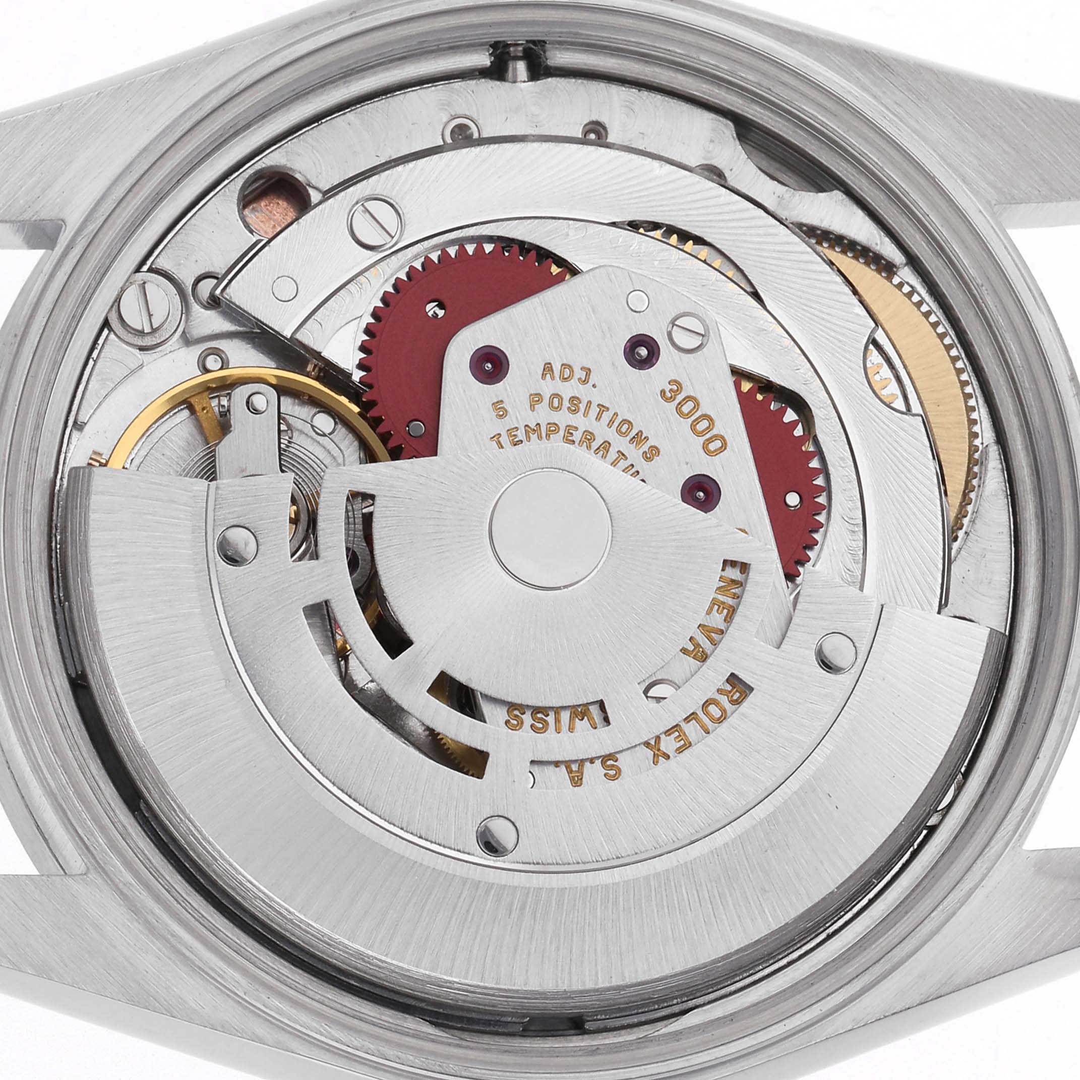 The image shows a close-up of the movement inside a Rolex Air-King 14010 Men's Stainless Steel Pink Dial 14010 Men's Stainless Steel Pink Dial watch, highlighting gears and the rotor.