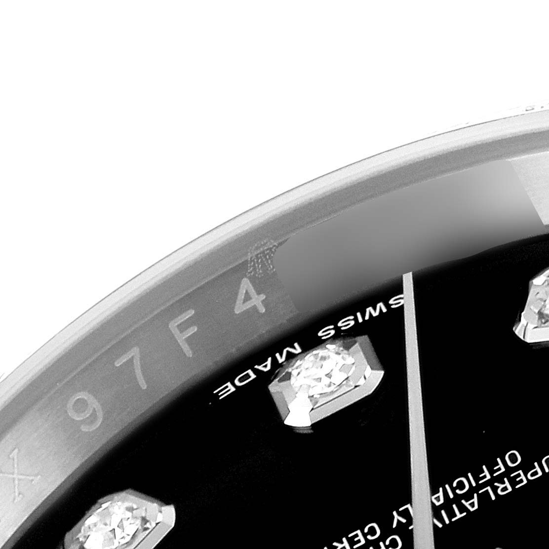 This image shows a close-up view of the dial and part of the bezel of a Rolex Datejust 116244 Men
s Stainless Steel Black Dial 116244 Men
s Stainless Steel Black Dial watch.