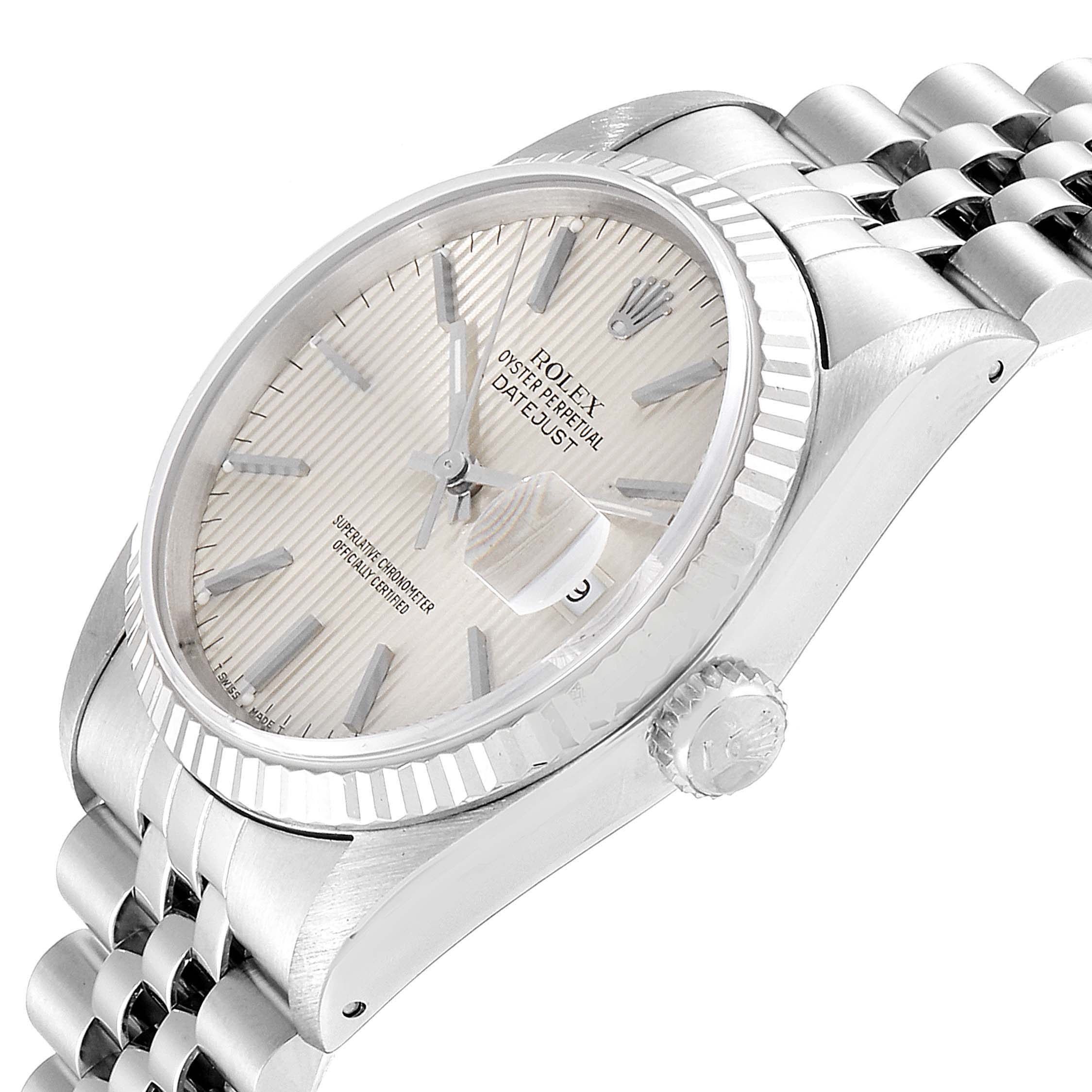 This image shows a side angle of the Rolex Datejust 16234 Men's Stainless Steel Silver Dial 16234 Men's Stainless Steel Silver Dial watch, highlighting the face, bezel, crown, and part of the bracelet.