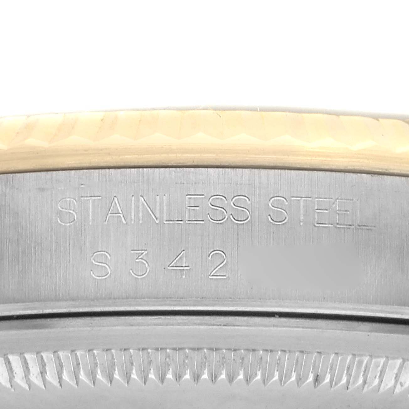 The image shows a close-up of the case back of a Rolex Datejust 16233 Men's Steel and Gold (two tone) Champagne Dial 16233 Men's Steel and Gold (two tone) Champagne Dial, focusing on the engraved text "STAINLESS STEEL S 342".