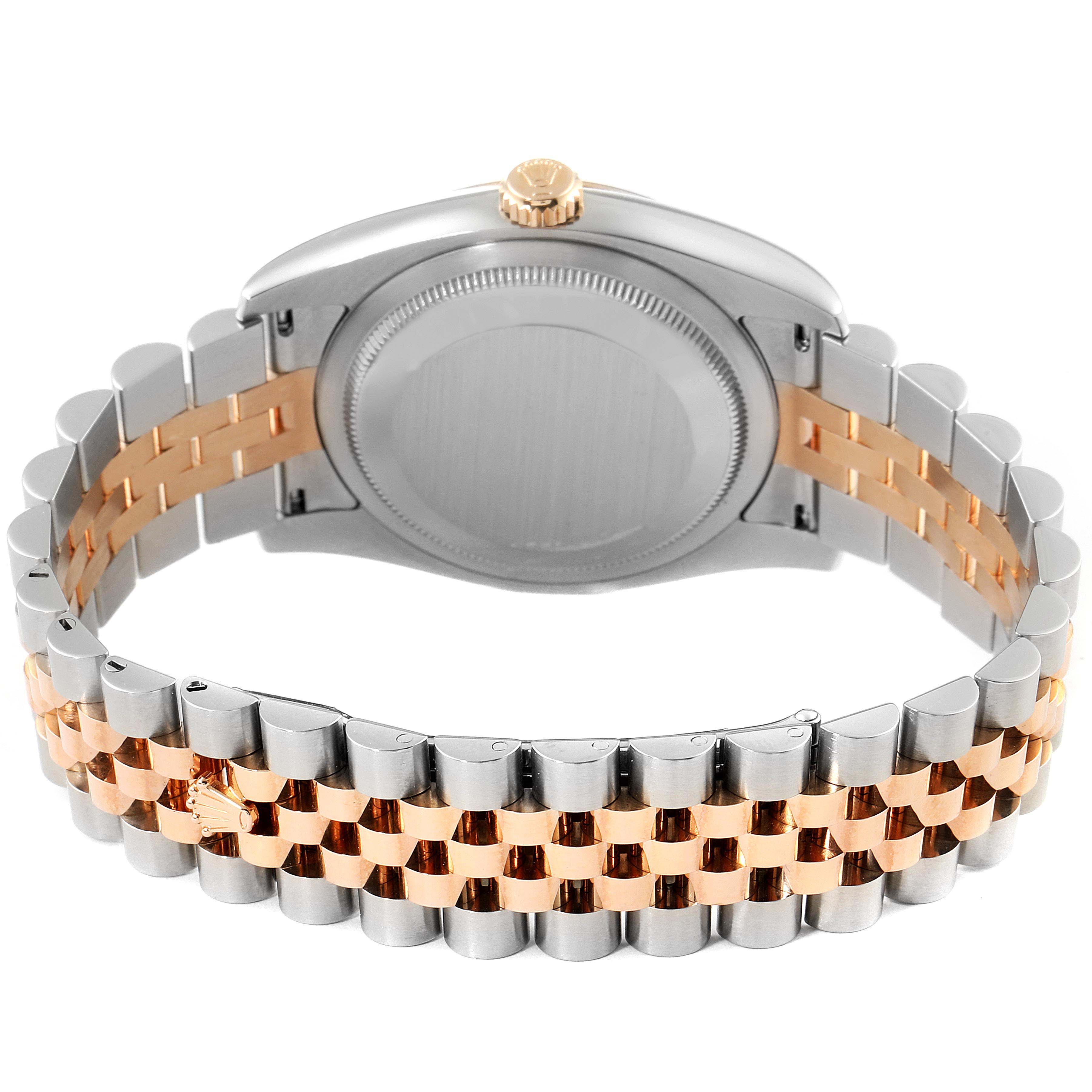 This image shows the back case and bracelet of a Rolex Datejust 116231 Men's Steel and Gold (two tone) Pink Dial 116231 Men's Steel and Gold (two tone) Pink Dial watch in a two-tone silver and gold design.