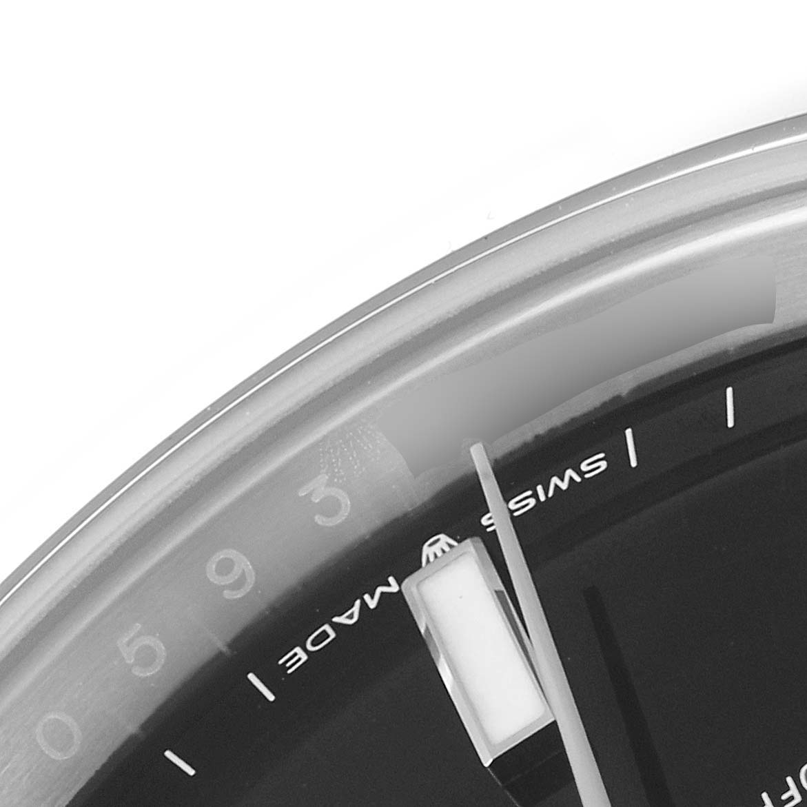 This image shows a close-up of the dial and the edge of the bezel of the Rolex Datejust 41 126300 Men's Stainless Steel Black Dial 126300 Men's Stainless Steel Black Dial watch.