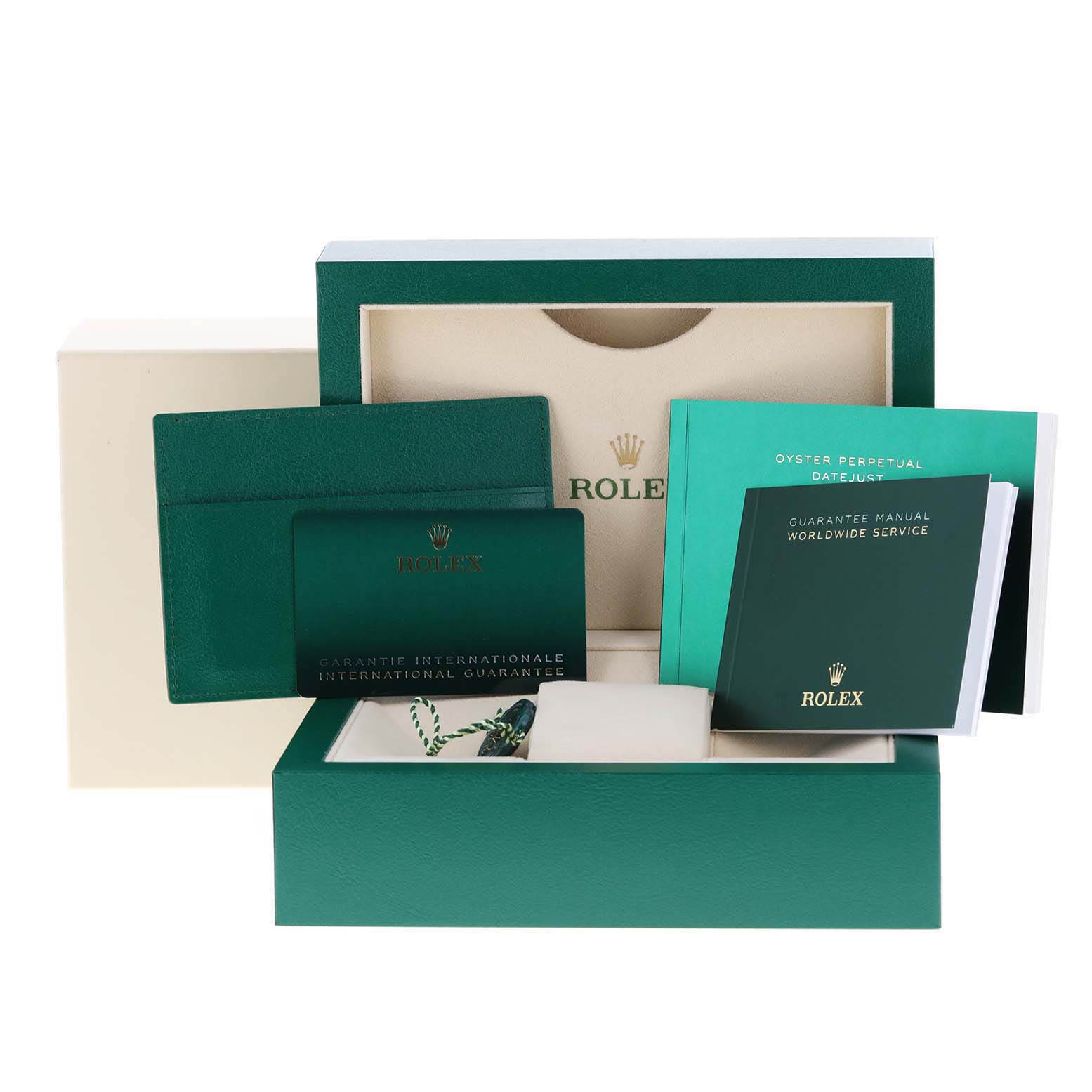The photo shows the packaging, warranty card, booklets, and accessories for the Rolex Datejust 41 126300 Men
s Stainless Steel Grey Dial 126300 Men
s Stainless Steel Grey Dial model.