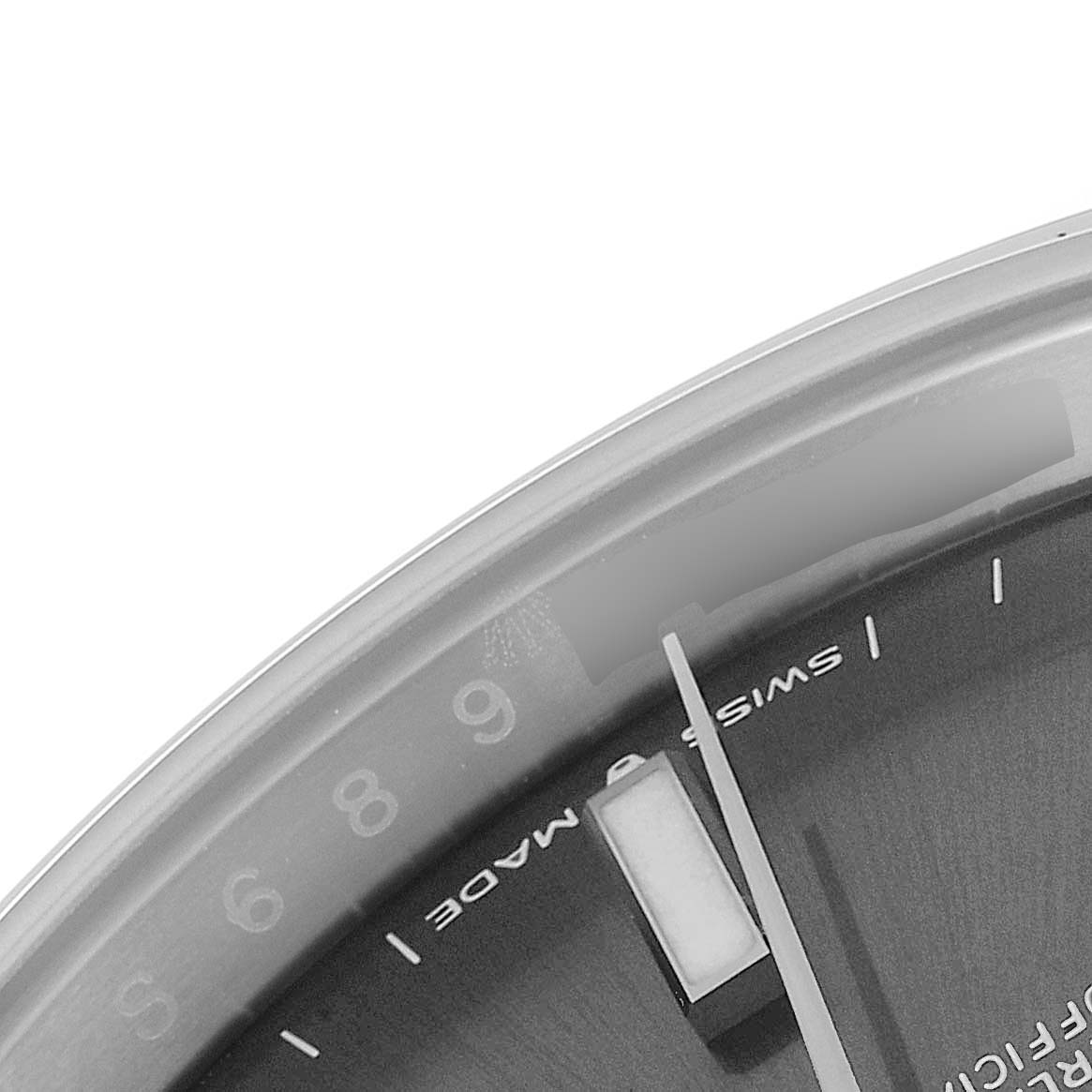 The image shows a close-up of the dial and bezel of a Rolex Datejust 41 126300 Men
s Stainless Steel Grey Dial 126300 Men
s Stainless Steel Grey Dial, highlighting the "Swiss Made" text and part of an hour marker.