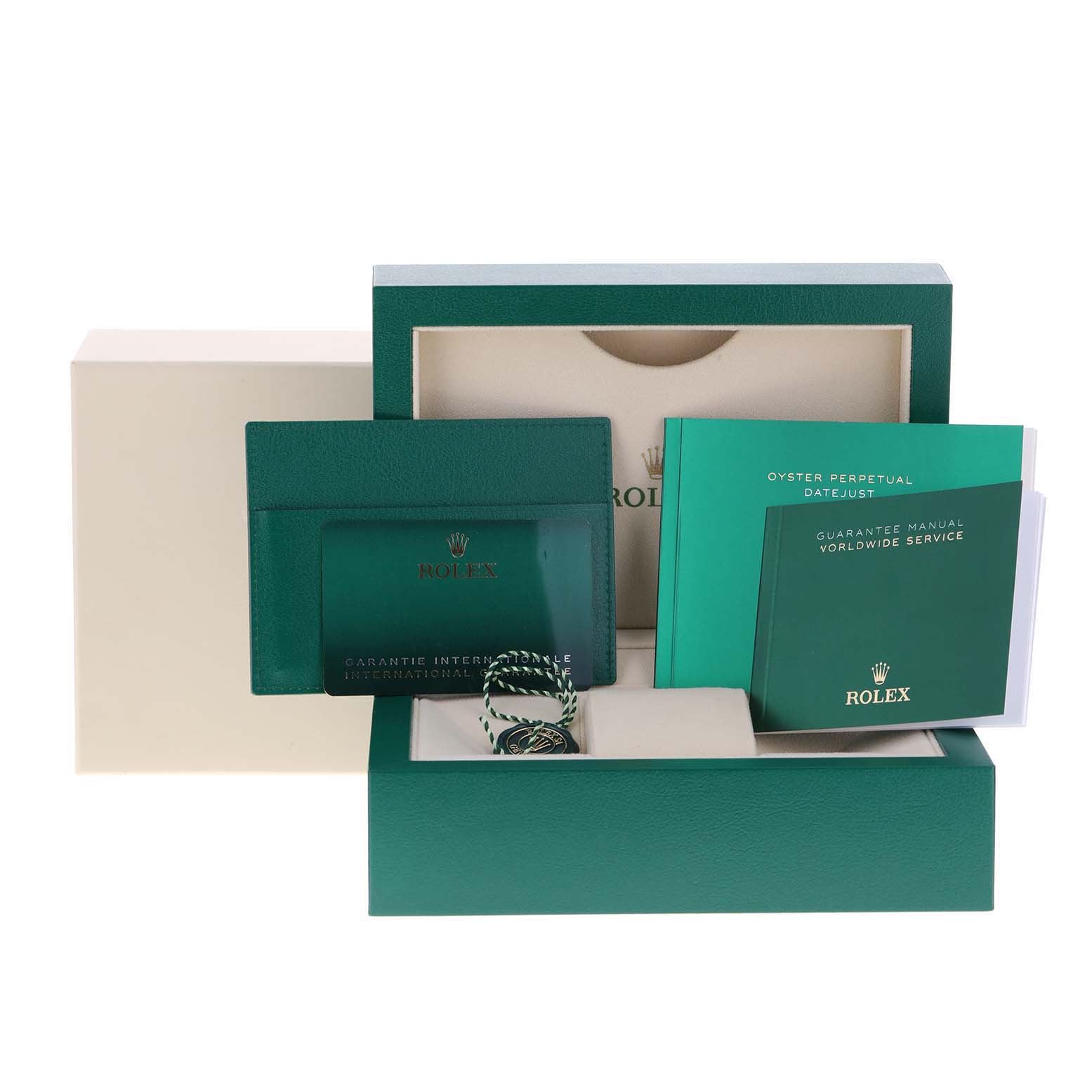 The image shows the box and accessories of a Rolex Datejust 41 126331 Men's Steel and Gold (two tone) Grey Dial 126331 Men's Steel and Gold (two tone) Grey Dial, including the warranty card, manuals, and tags.
