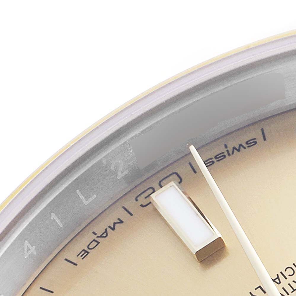 This image shows a close-up of the dial, hour marker, and "Swiss Made" text of the Rolex Datejust 41 126303 Men's Steel and Gold (two tone) Champagne Dial 126303 Men's Steel and Gold (two tone) Champagne Dial watch.