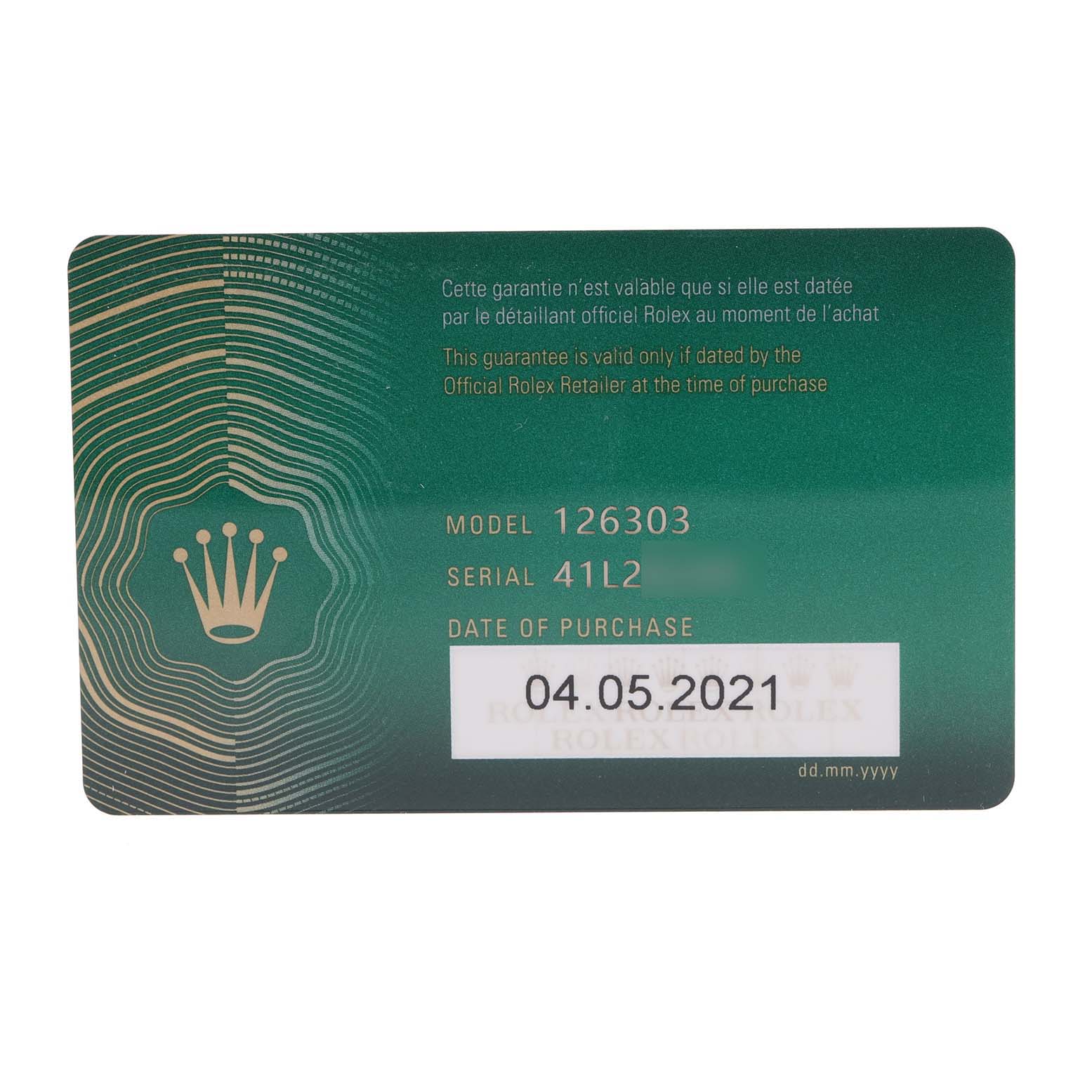 This image shows a guarantee card for the Rolex Datejust 41 126303 Men's Steel and Gold (two tone) Champagne Dial 126303 Men's Steel and Gold (two tone) Champagne Dial model, including model and serial number, and date of purchase.