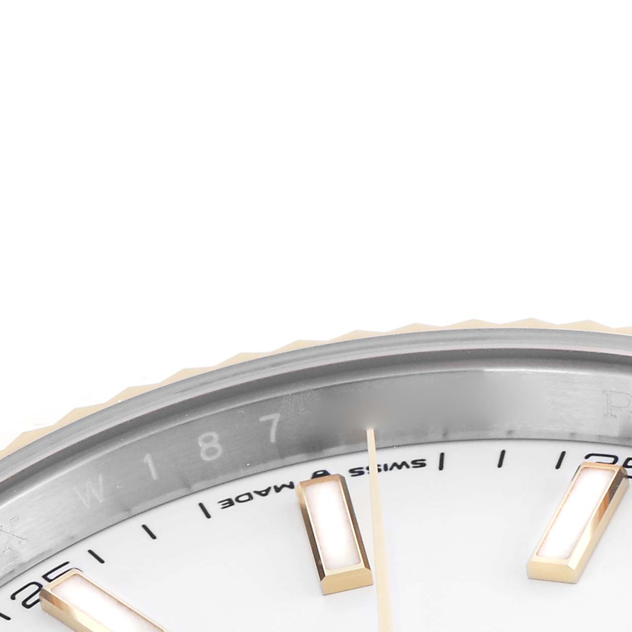 The image shows a close-up of the Rolex Datejust 41 126333 Men's Steel and Gold (two tone) White Dial 126333 Men's Steel and Gold (two tone) White Dial watch dial, featuring hour markers, part of the bezel, and minute markings.
