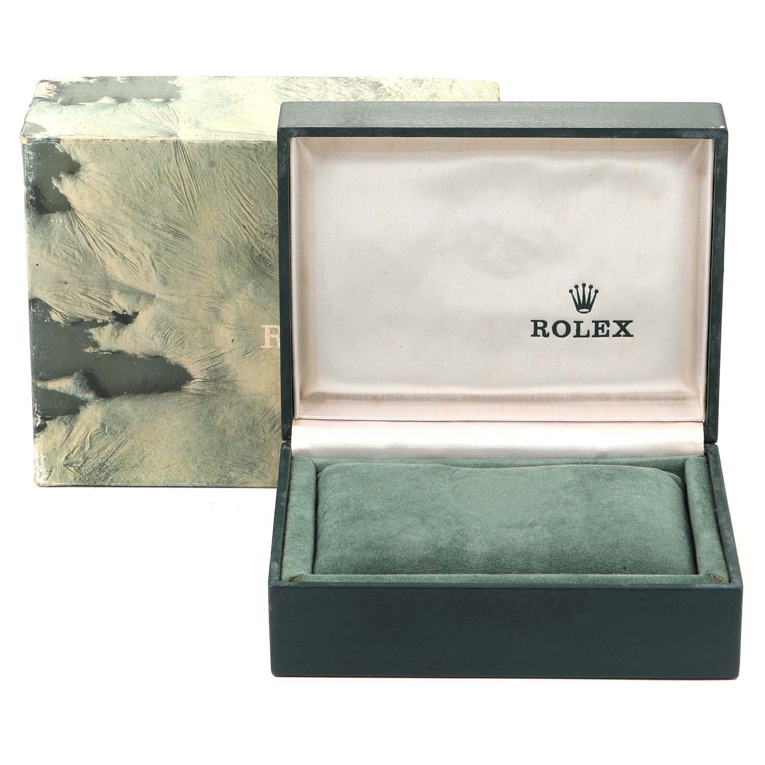 This image shows the open box for a Datejust model by Rolex, revealing its cushioned interior and the outer box.