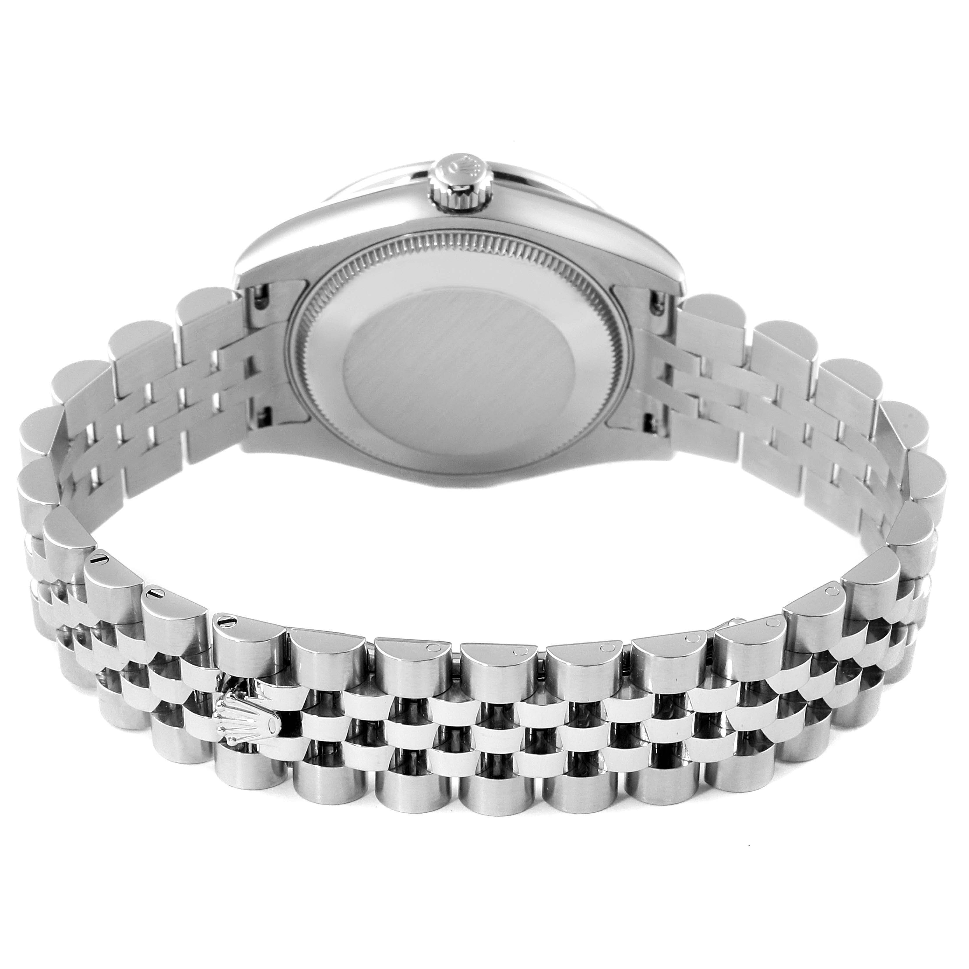 This image shows the back and bracelet of a Mid-Size Rolex watch from a rear angle.