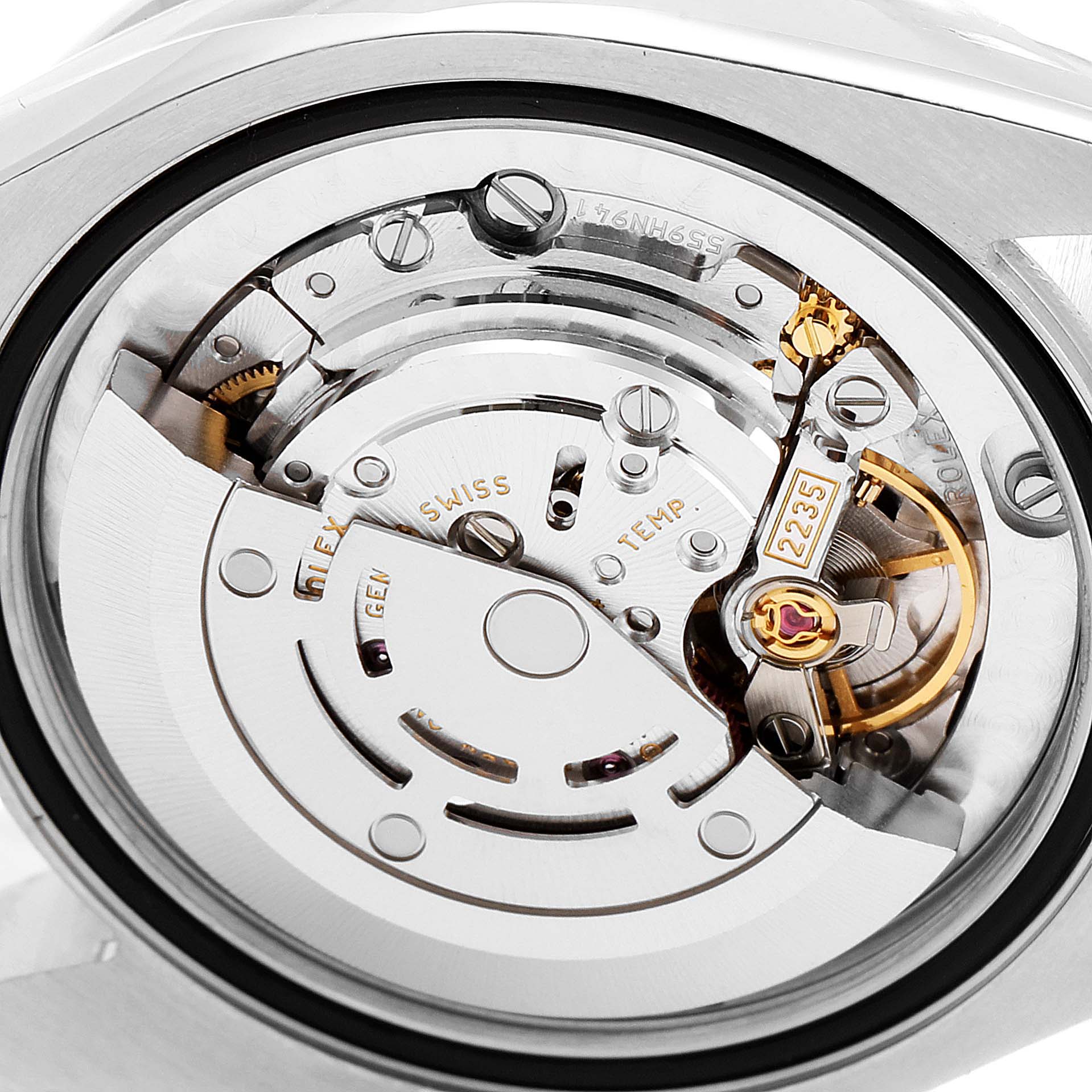 This image shows the internal mechanics and movement of a Rolex Mid-Size 178384 Women's Stainless Steel Mother of Pearl Dial 178384 Women's Stainless Steel Mother of Pearl Dial model from a close-up, rear view angle.