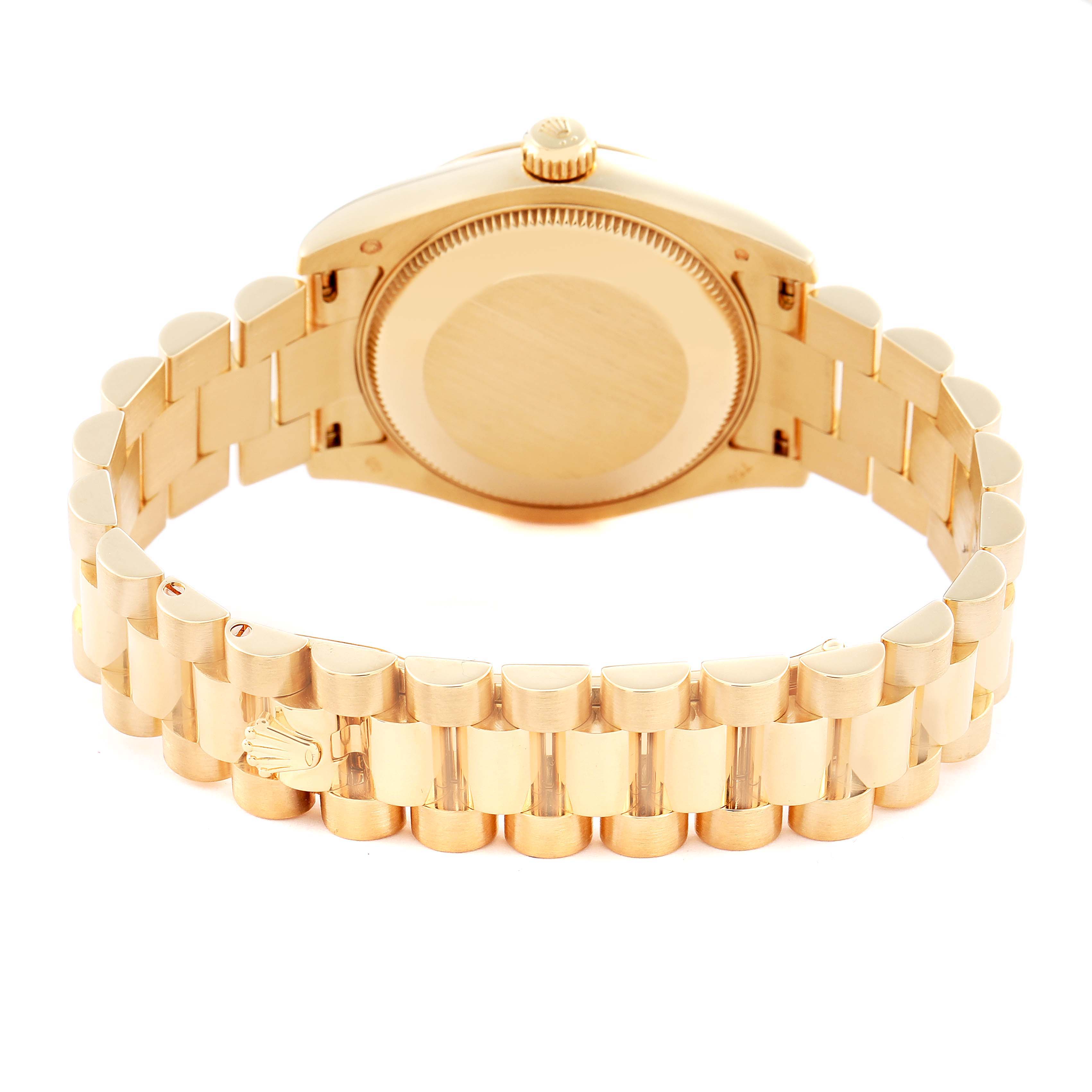 The image shows the back and bracelet of a Rolex Mid-Size watch from an angled rear view.