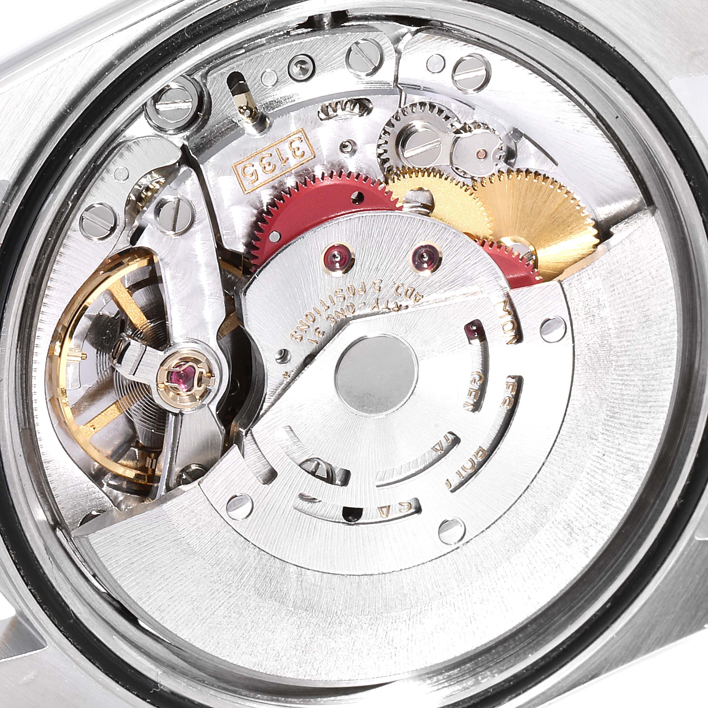 The image shows the intricate inner mechanism of a Rolex Datejust 16233 Men
s Steel and Gold (two tone) Champagne Dial 16233 Men
s Steel and Gold (two tone) Champagne Dial watch, viewed from the back angle.