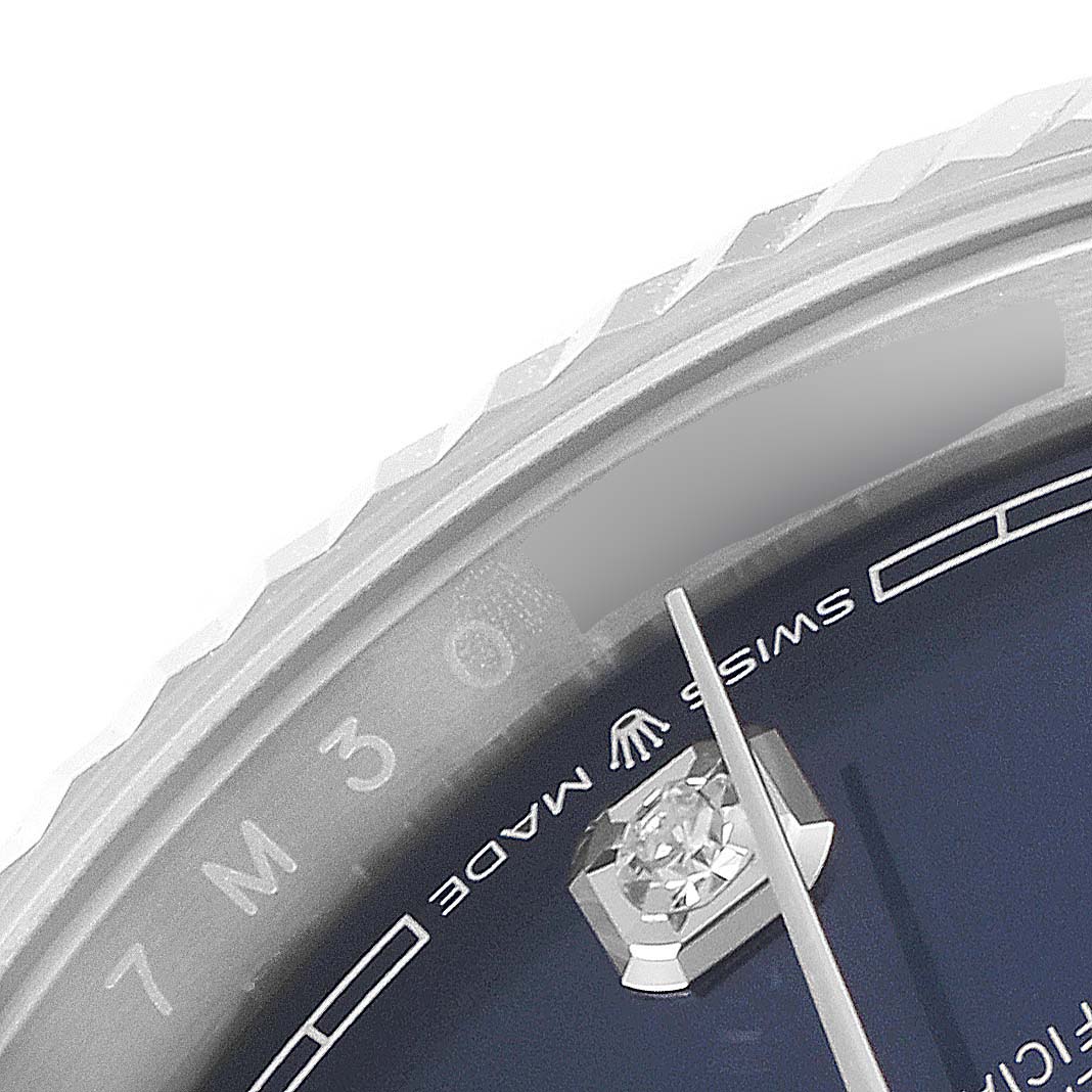 This close-up image shows the dial and bezel details of a Rolex Datejust 126234 Men's Stainless Steel Blue Dial 126234 Men's Stainless Steel Blue Dial watch, including the minute markers and "SWISS MADE" text.