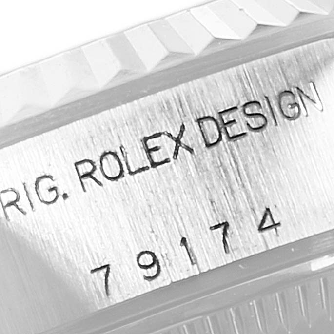 This image shows a close-up of the engraved model number on the case side of a Rolex Datejust 79174 Women's Stainless Steel Blue Dial 79174 Women's Stainless Steel Blue Dial watch.